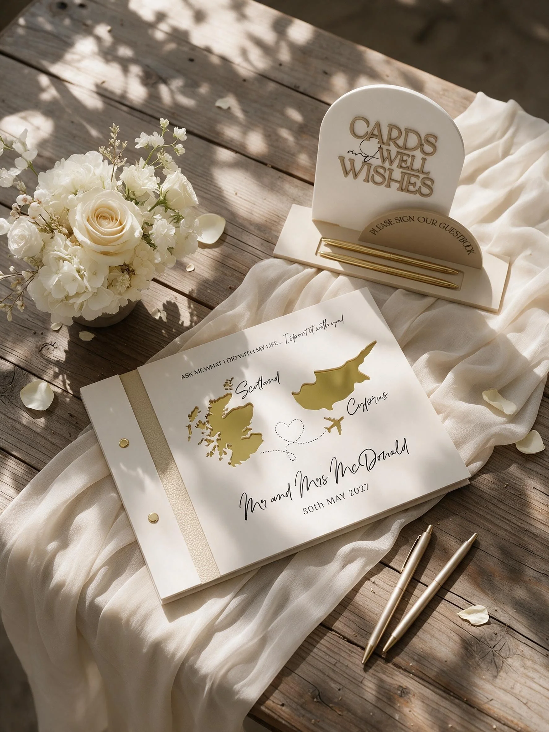 Personalised destination wedding guestbook with a matching acrylic guestbook sign and pens