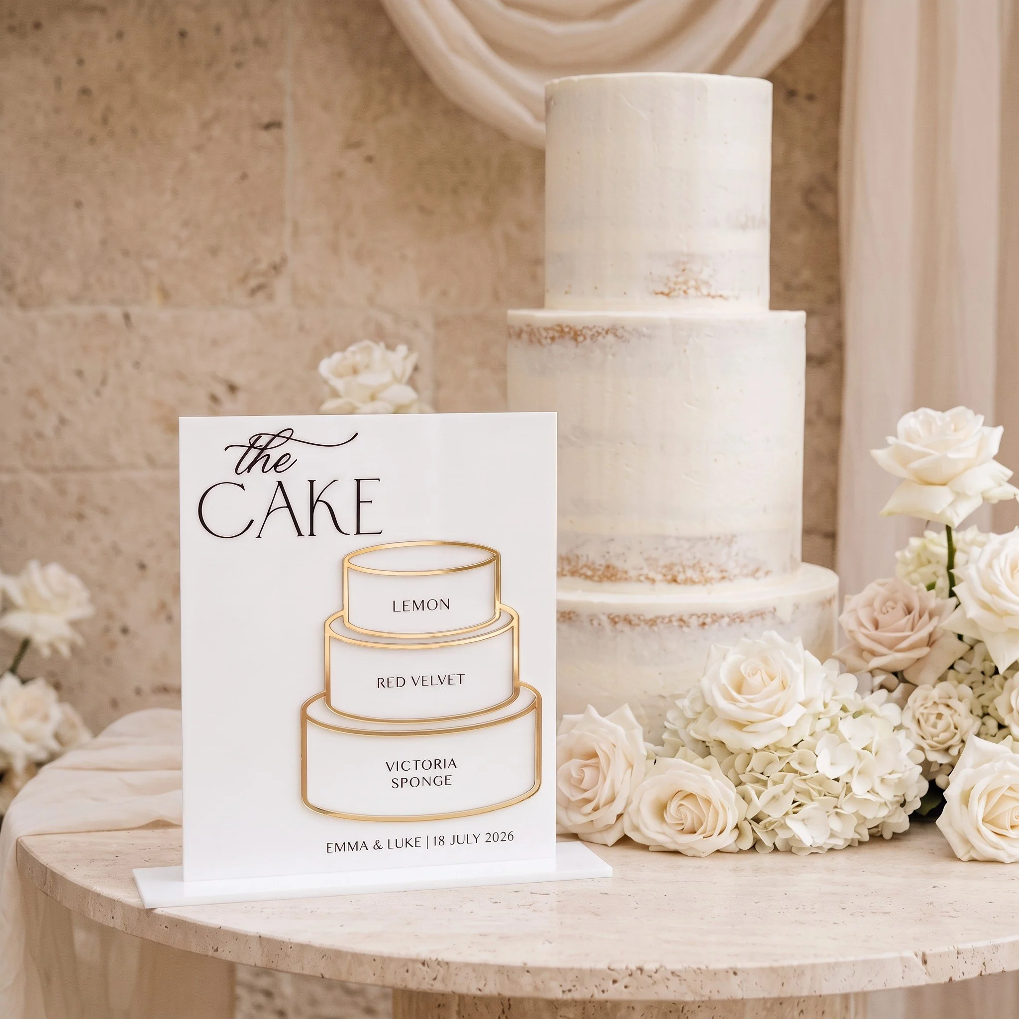 Acrylic cake sign displaying the flavours inside each tier of a wedding cake.