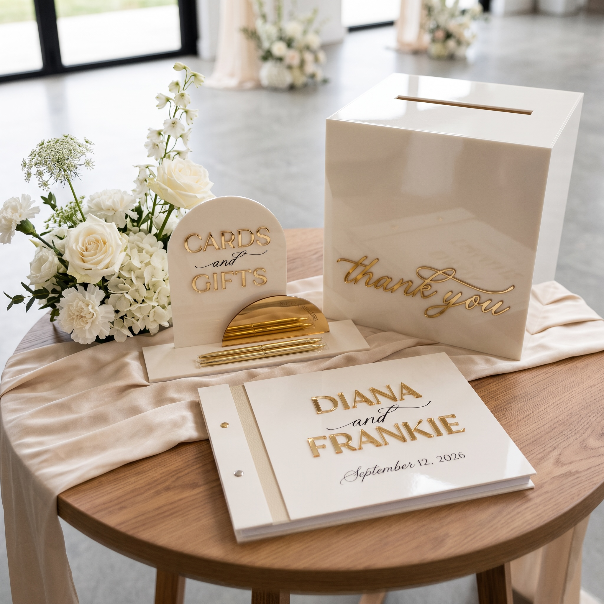 Personalised acrylic guestbook bundle styled on an elegant wedding table