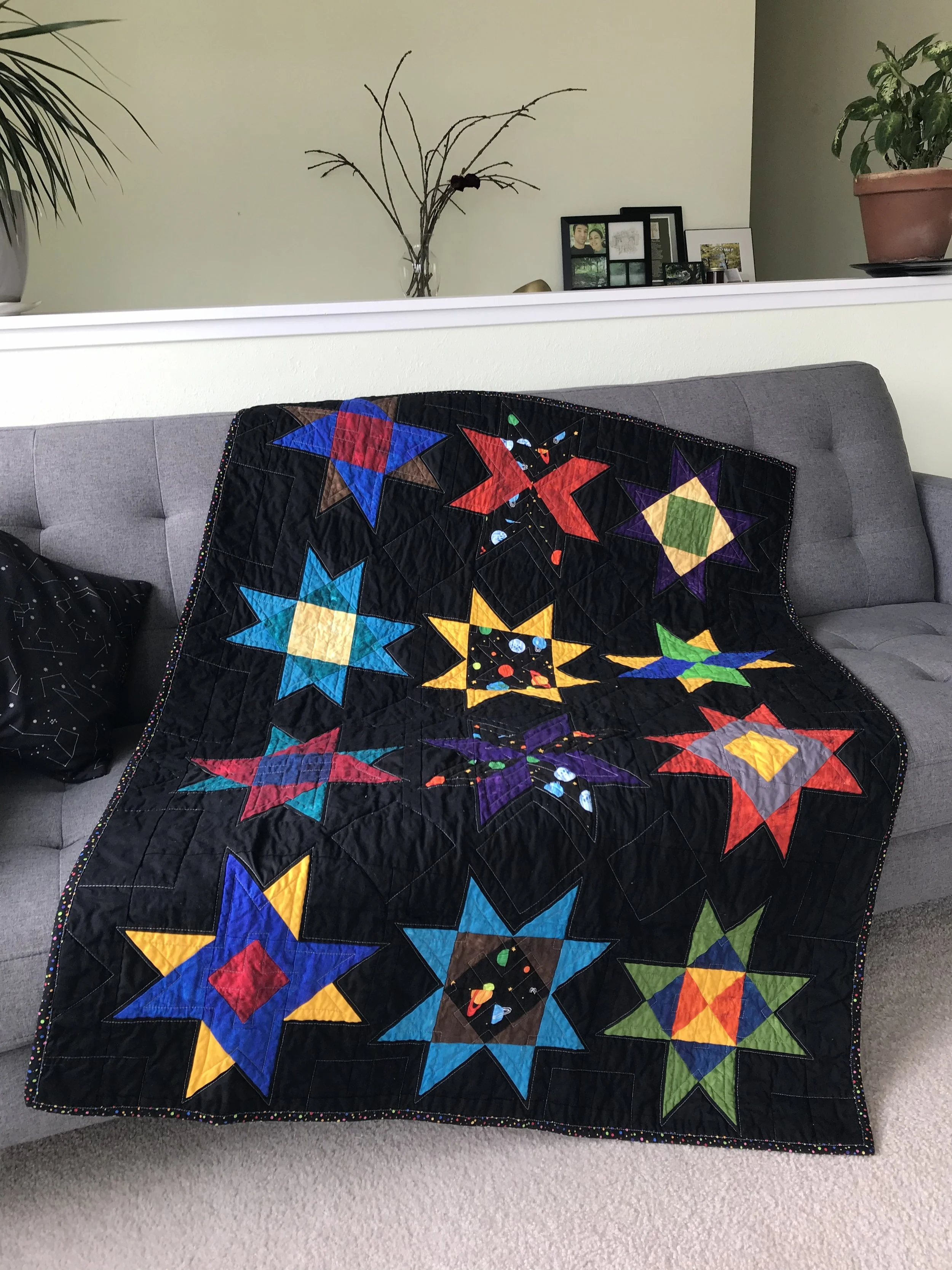 patchwork stars on black background