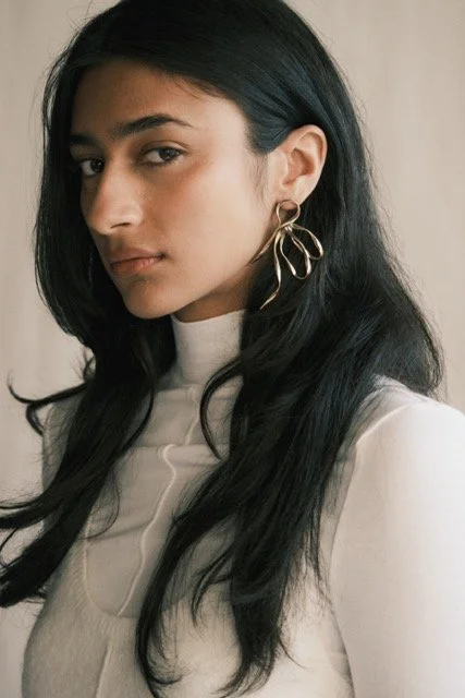 Click any image for full creative credits, including photographer, hair and makeup, and styling.