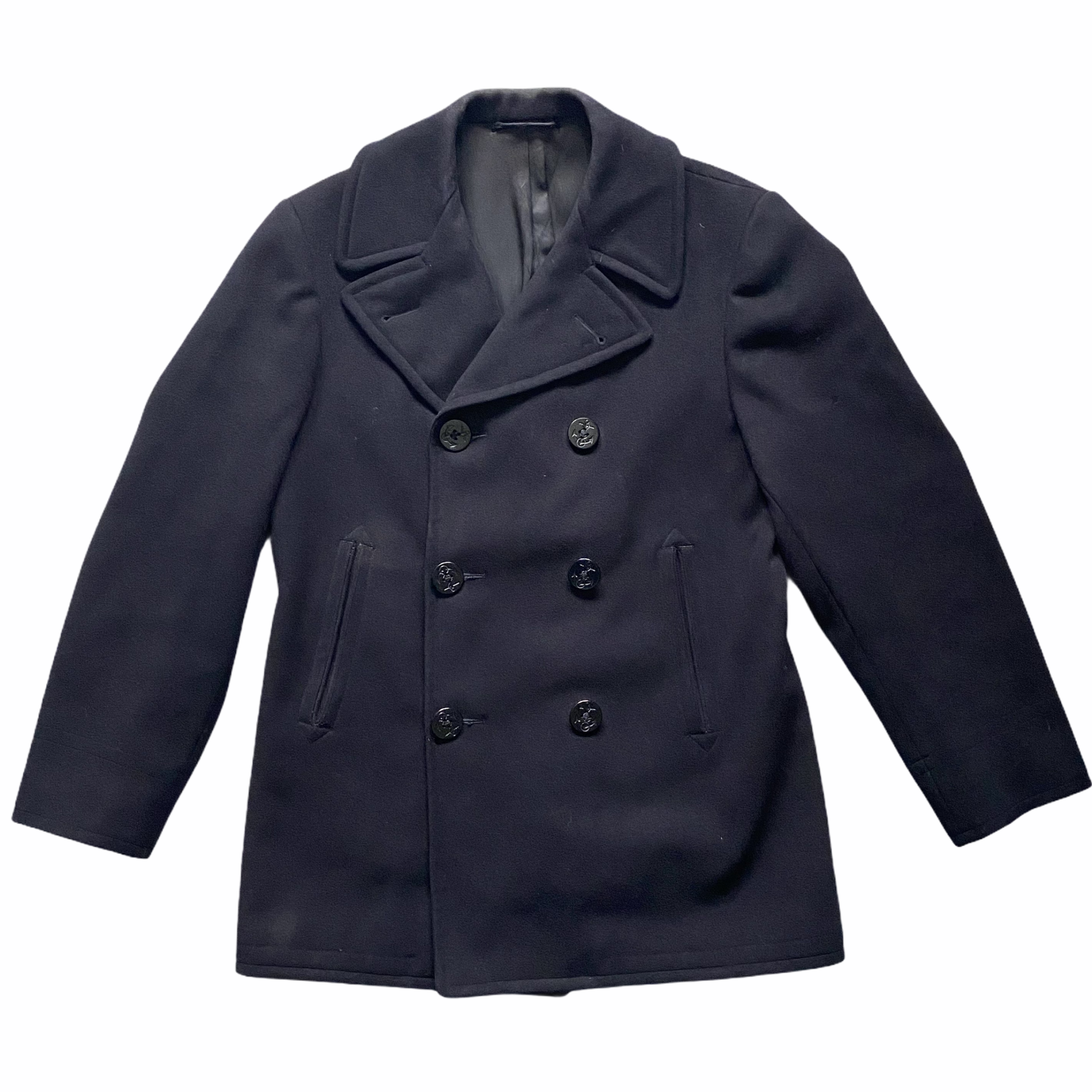 Close-up image of a black double-breasted coat with six buttons, lapel collar, and leather interior lining.