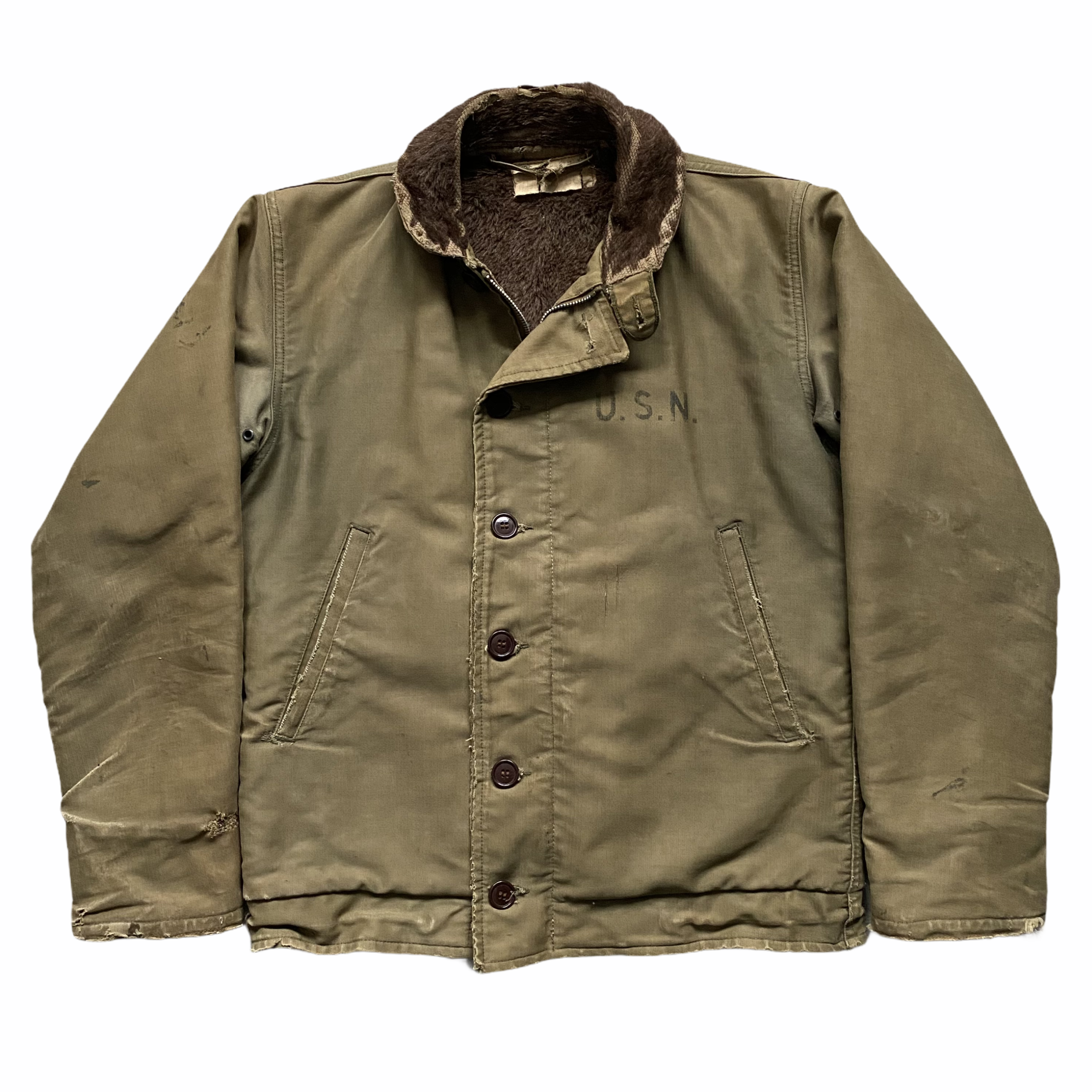 Olive green military jacket with brown fleece collar and "U.S.N." stenciled on the chest, laid flat on a white background.