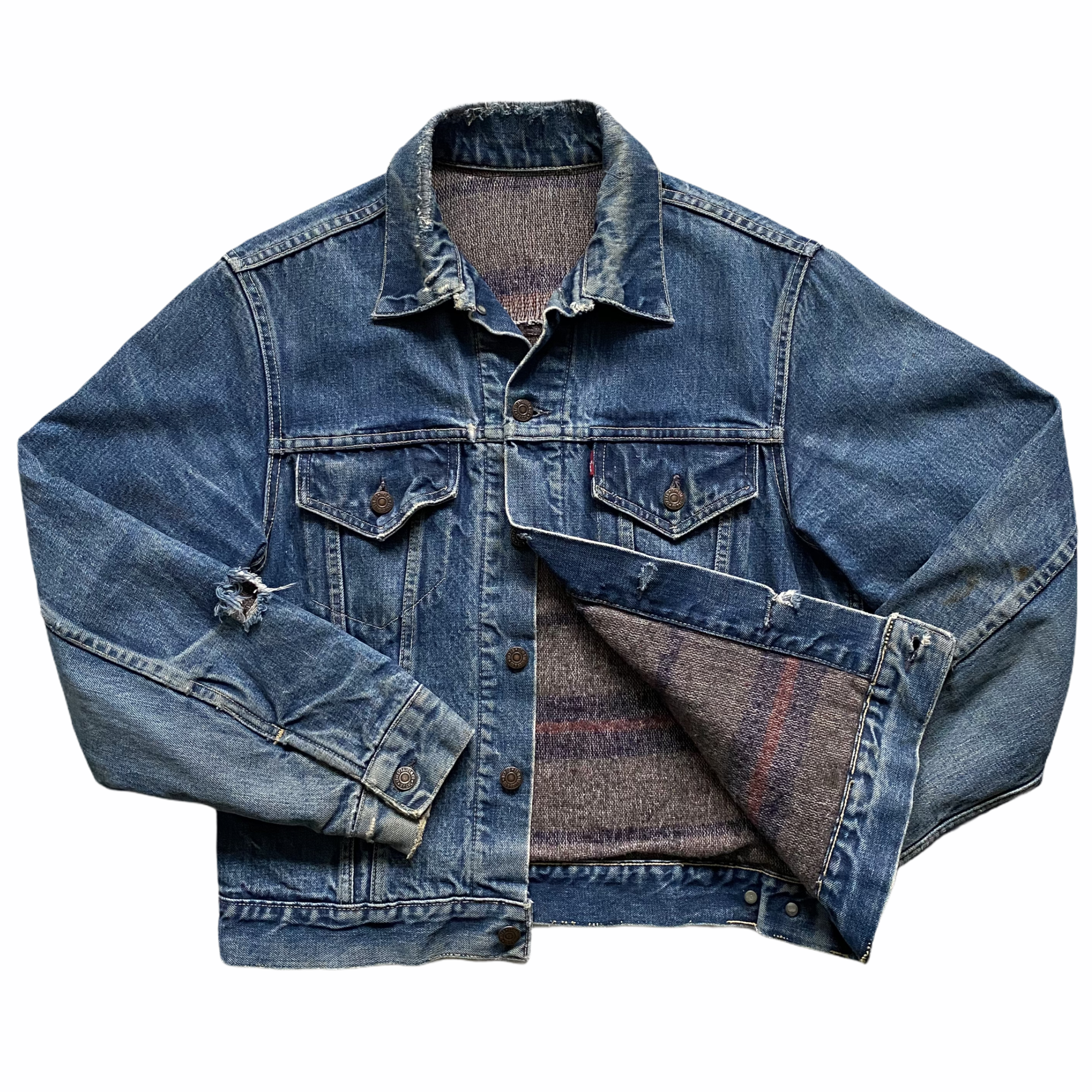 A blue denim jacket with a frayed collar and distressed details, laid flat on a white background.
