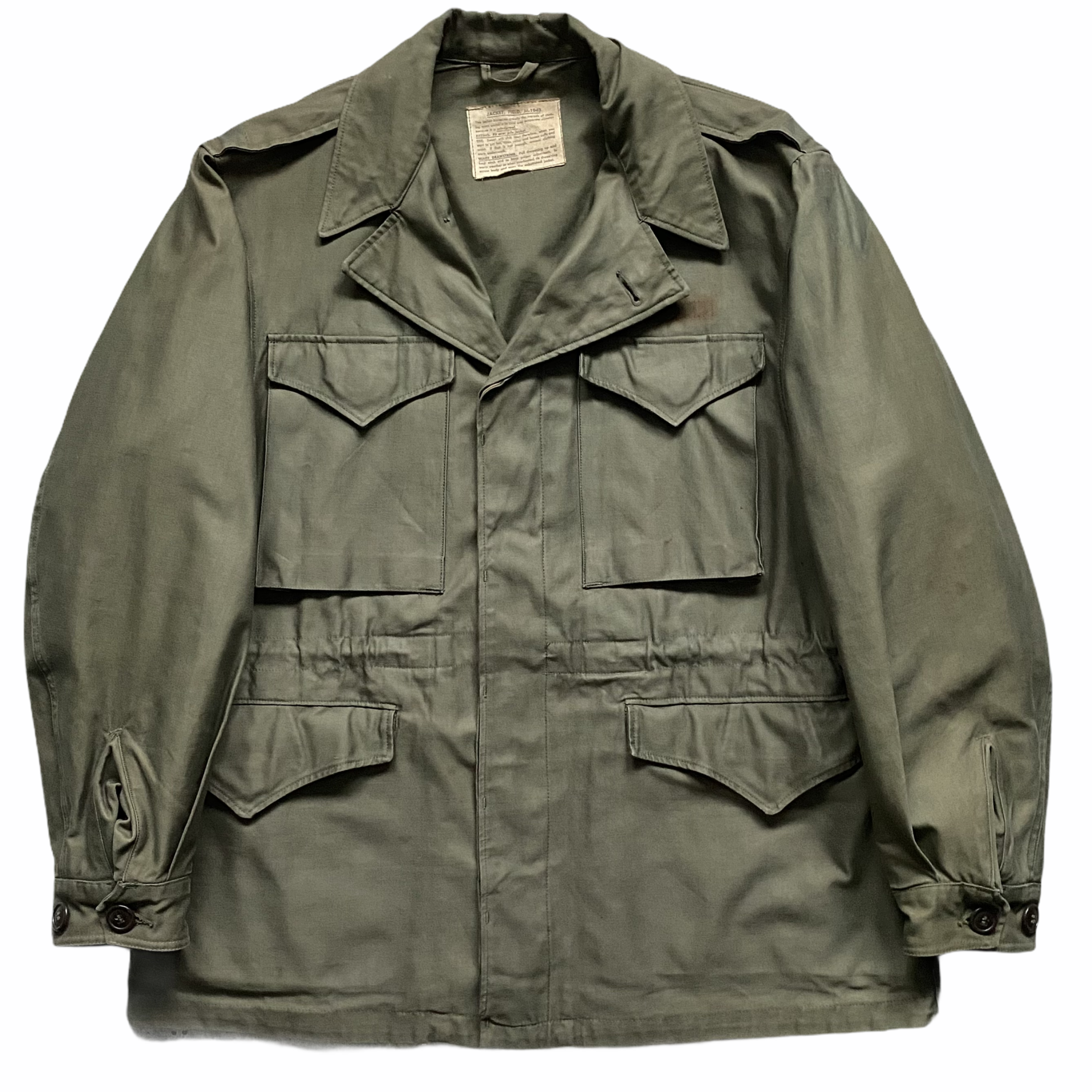 A military-style olive green jacket with multiple pockets, buttons on the sleeves, and a collar, laid flat against a white background.