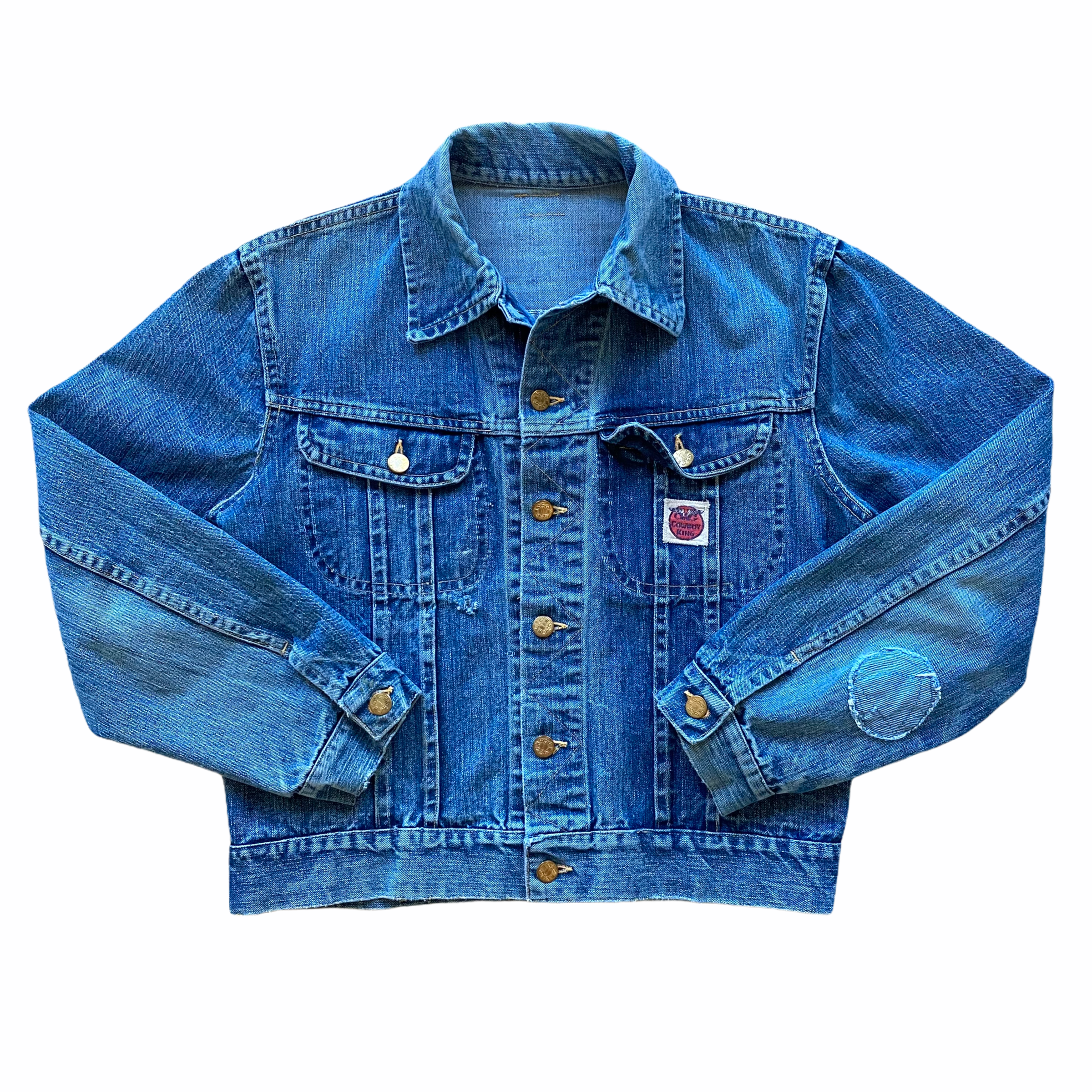 A blue denim jacket with metal buttons and a small red and white label on the pocket.