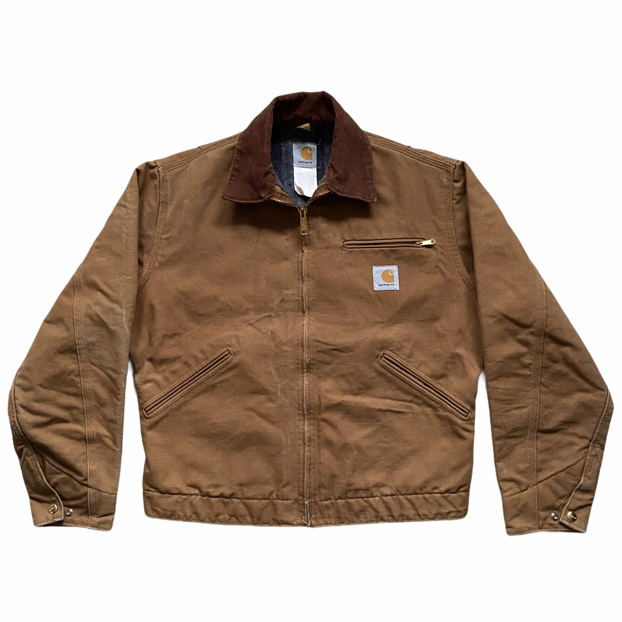 A brown Carhartt jacket with a brown corduroy collar, front zipper, and multiple pockets, isolated on a white background.