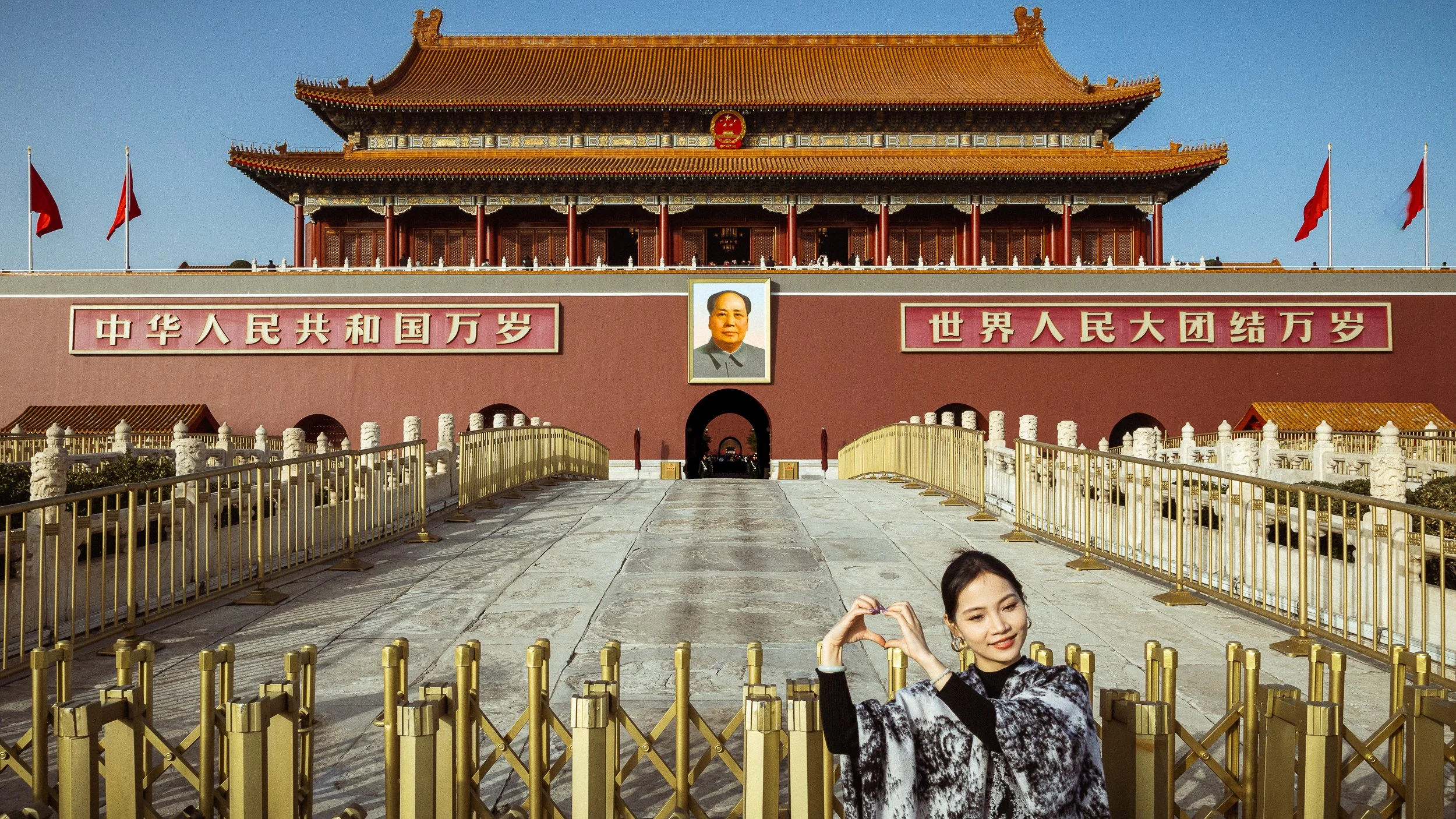 She came for a photo. He's already been in every one taken here. Beijing, China. 2025.