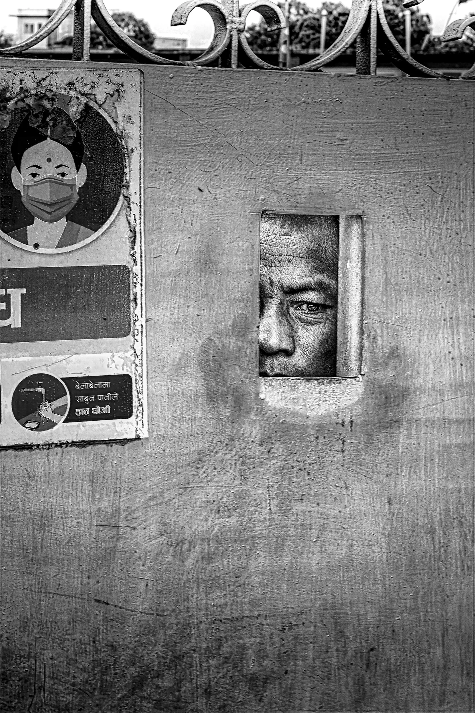 policeperson looking though peephole