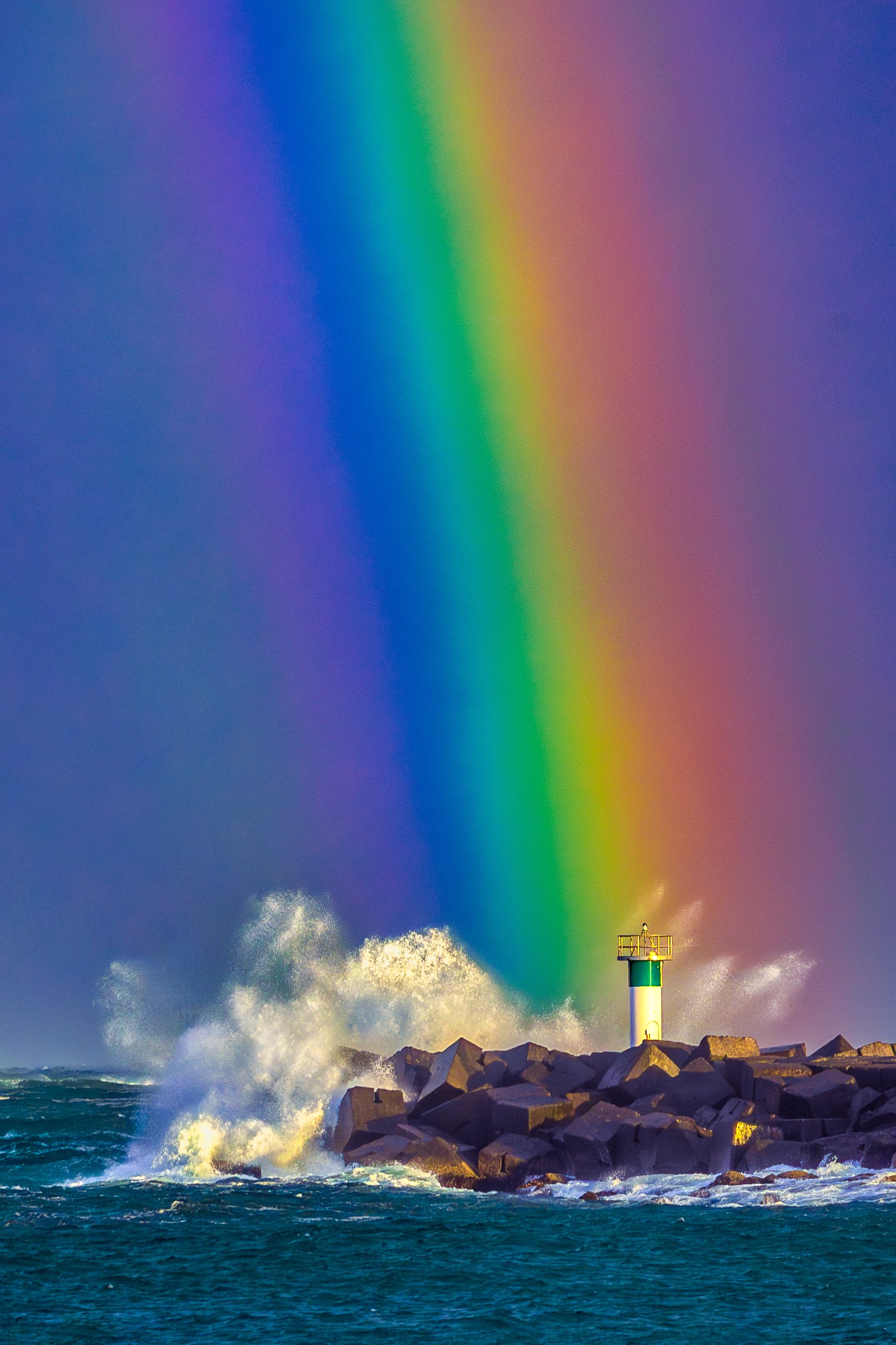 wave splashing lighthouse in gold coast, 2024