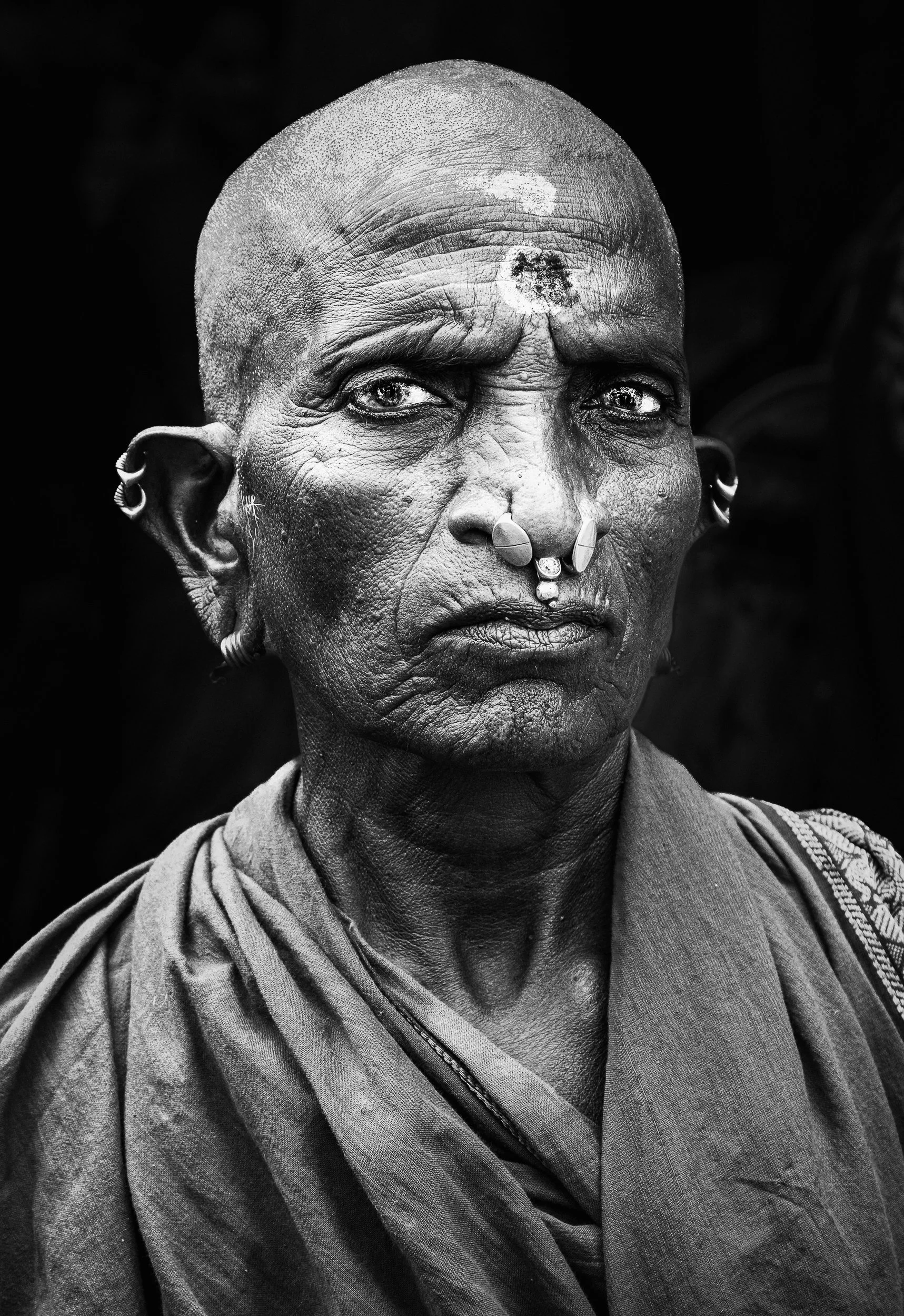 She held the stare longer than I expected. — Varanasi, India. 2025