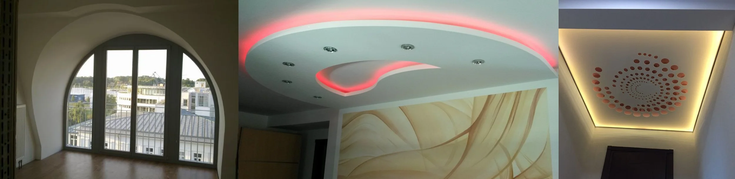Innenraum mit großen Fenstern, abgerundeter Decke mit rotem LED-Licht, dekorativer Wandgestaltung und beleuchteter Decke mit rote und gelbe Beleuchtung.