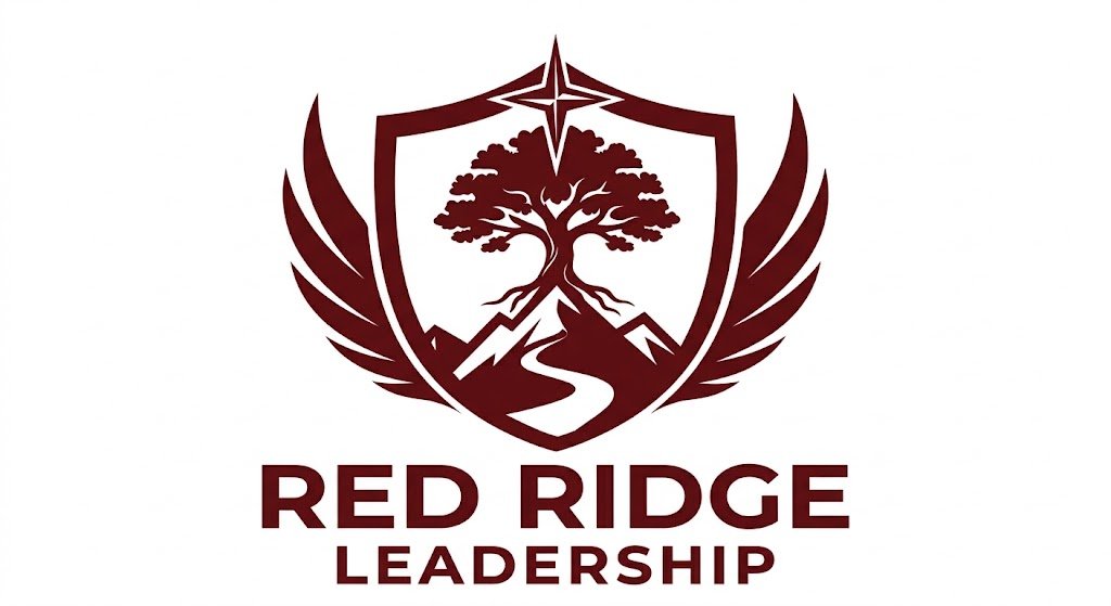 A stylized logo with a shield, a tree, mountain peaks, a winding path, and a compass star at the top, with wings extending from the shield and the words "Red Ridge Leadership" below.