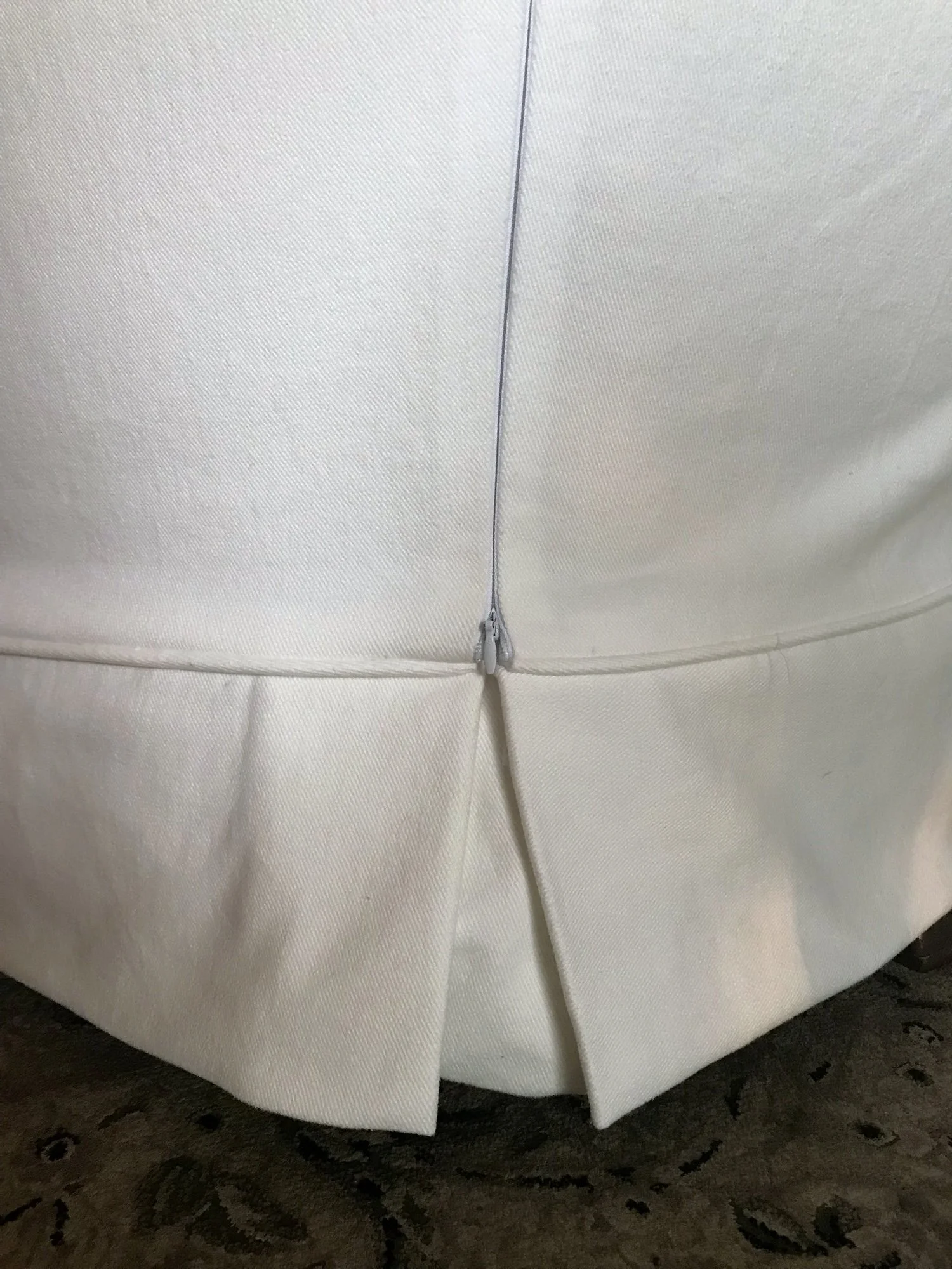 Fit like-a-glove detail with invisible zipper closure
