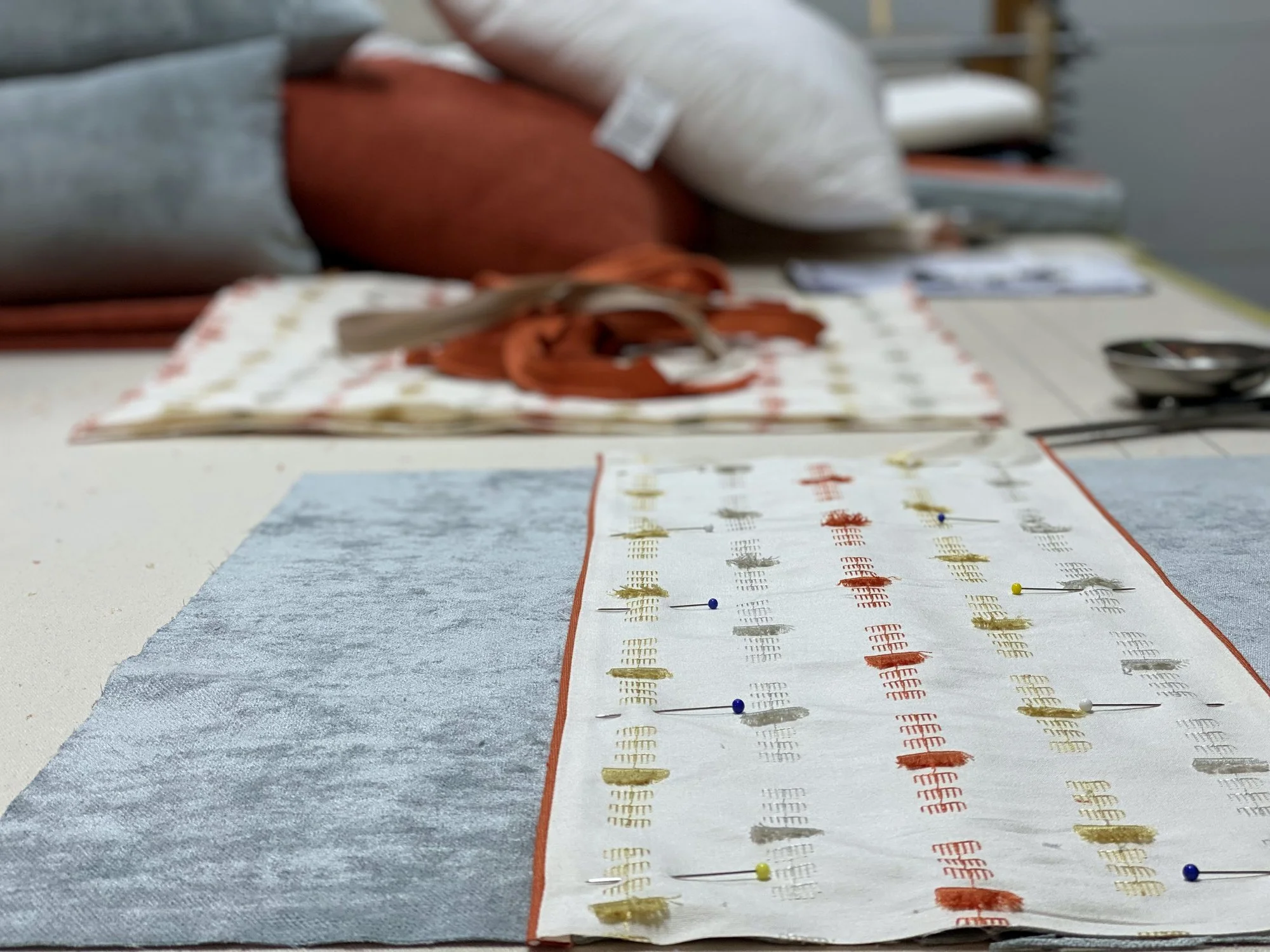 Blue and terra cotta pillow fabrication