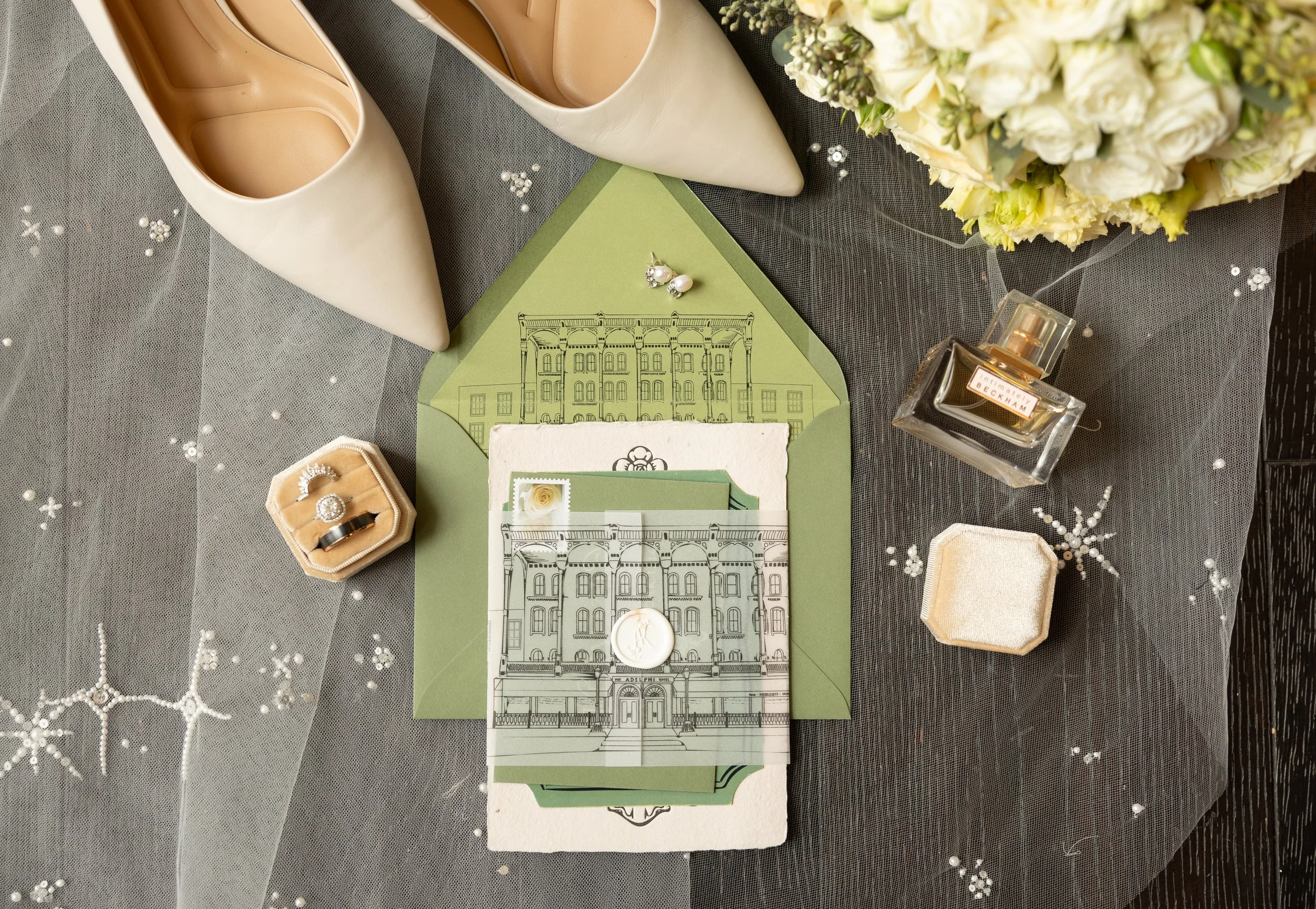 Custom venue illustration, belly band, wax seal, envelope liner