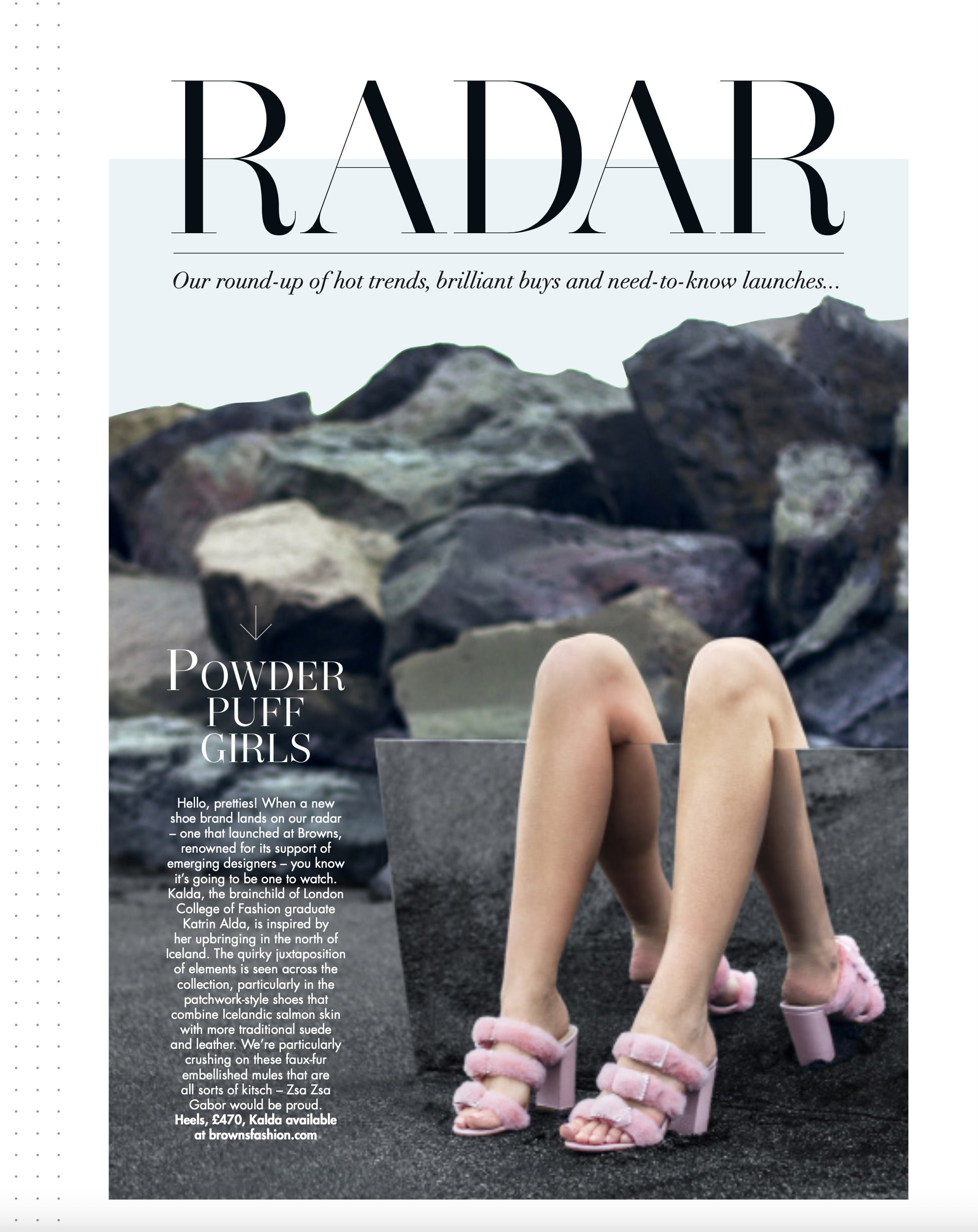 Magazine page featuring a woman in pink furry high-heeled shoes with her legs up in the air, ocean rocks in the background, and headline 'Powder Puff Girls' with text about a new shoe brand launch.