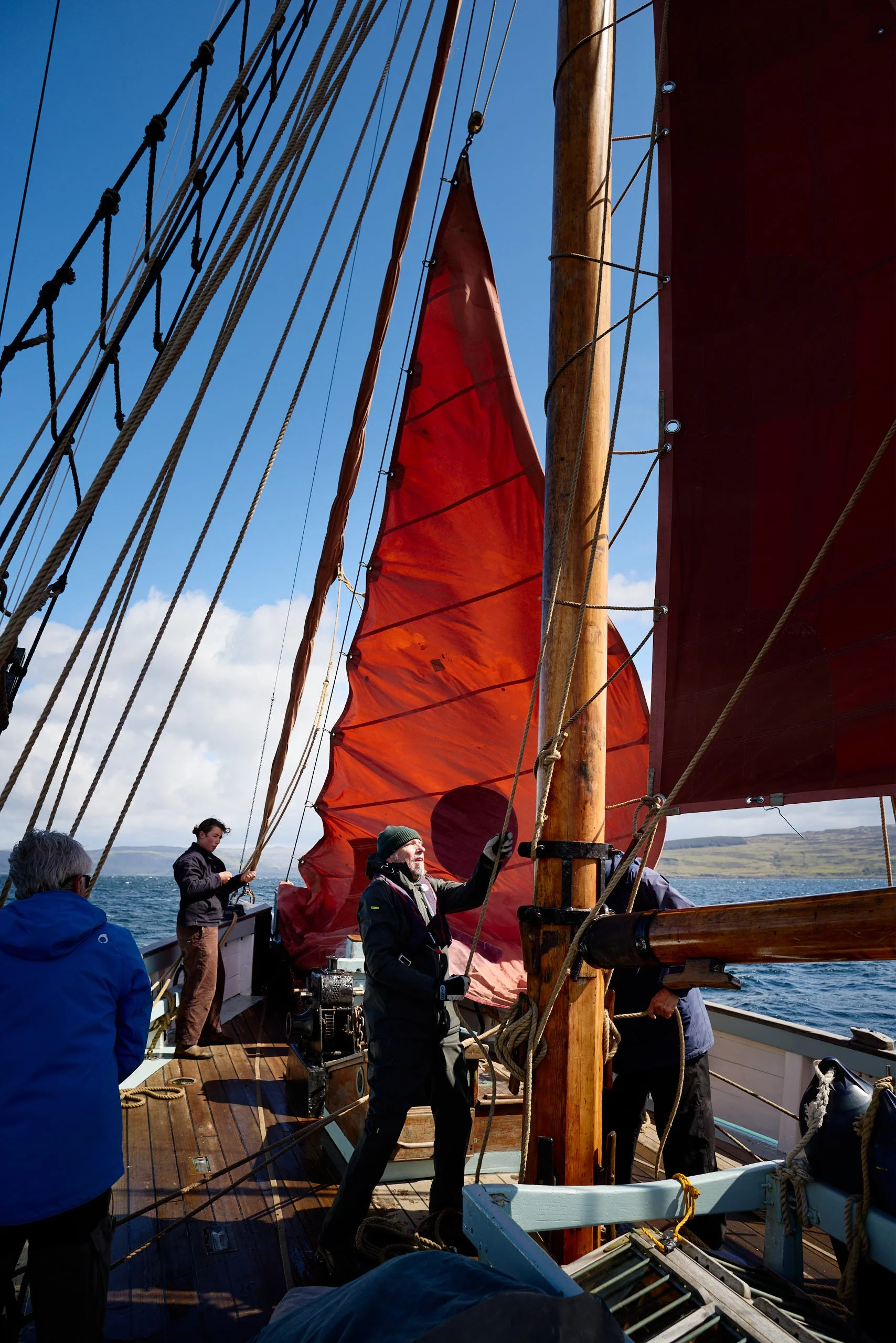 Crew on Provident adjusting sails