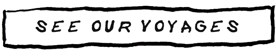 Hand-drawn sign with the message 'See Our Voyages' in black lettering on a white background.