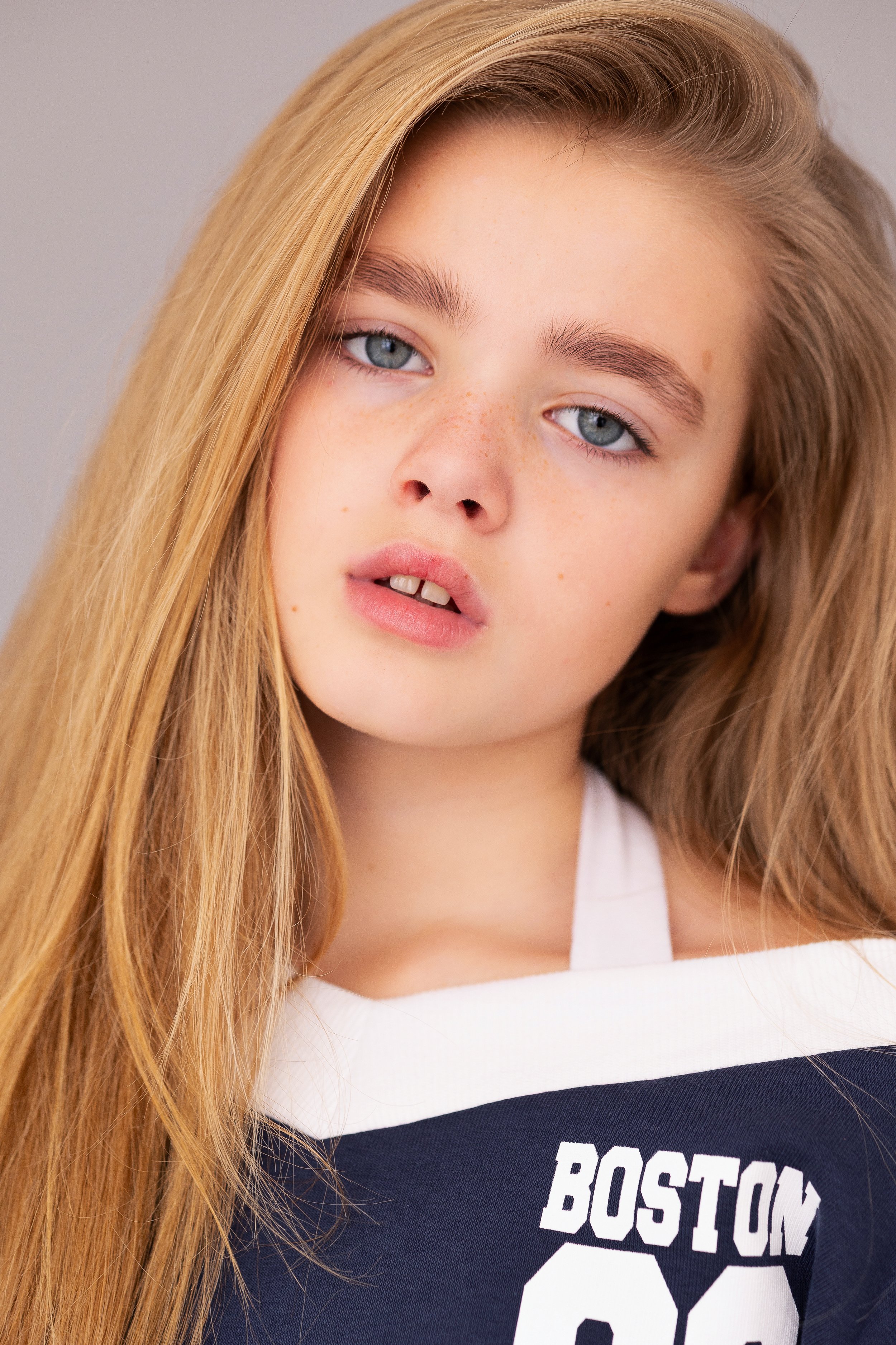 Close-up child model headshot with a natural expression for an acting and modelling portfolio update.
