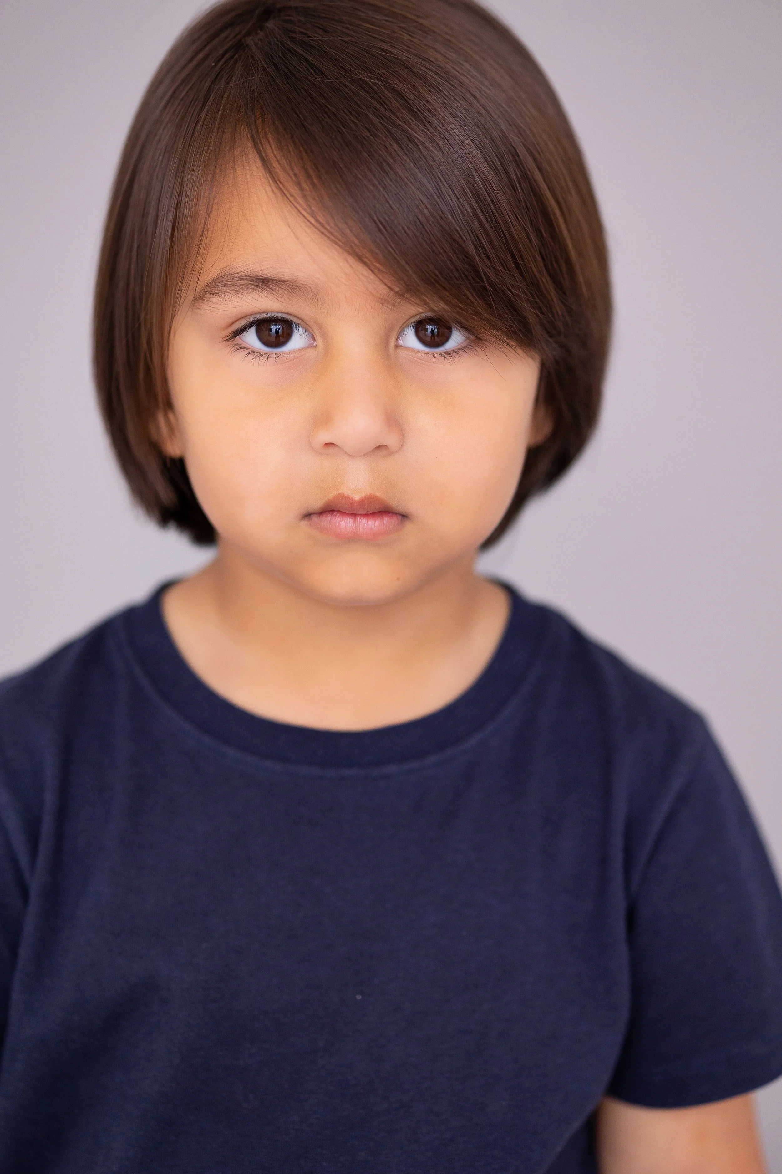 
Close-up child model headshot with a natural expression for a professional modelling and acting portfolio update.
