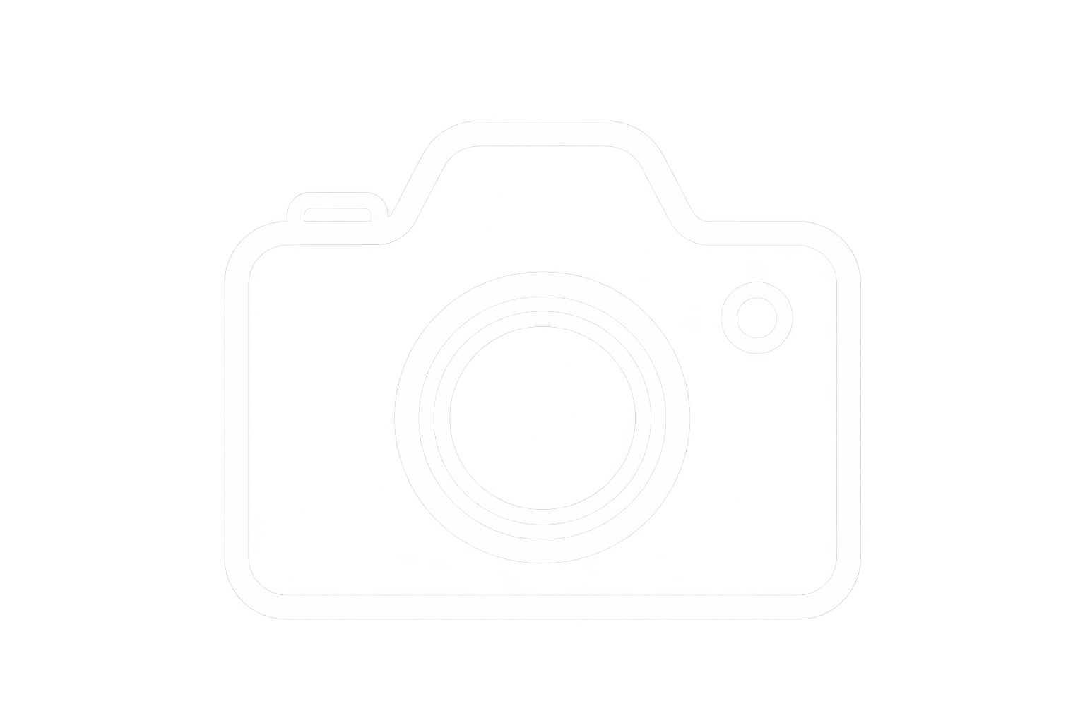 Image of a camera with a white body and a lens in the center, set against a black background.
