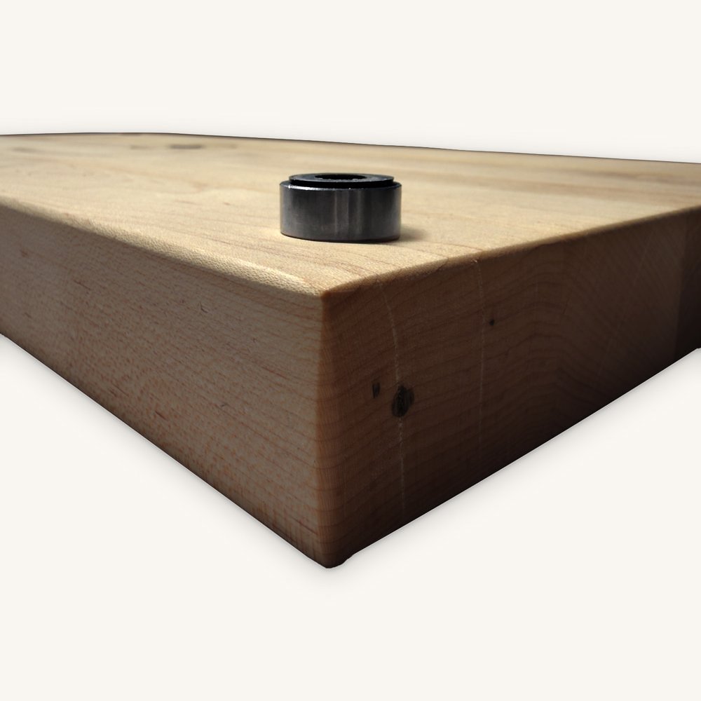 Elevated butcher block corner on a black disc riser