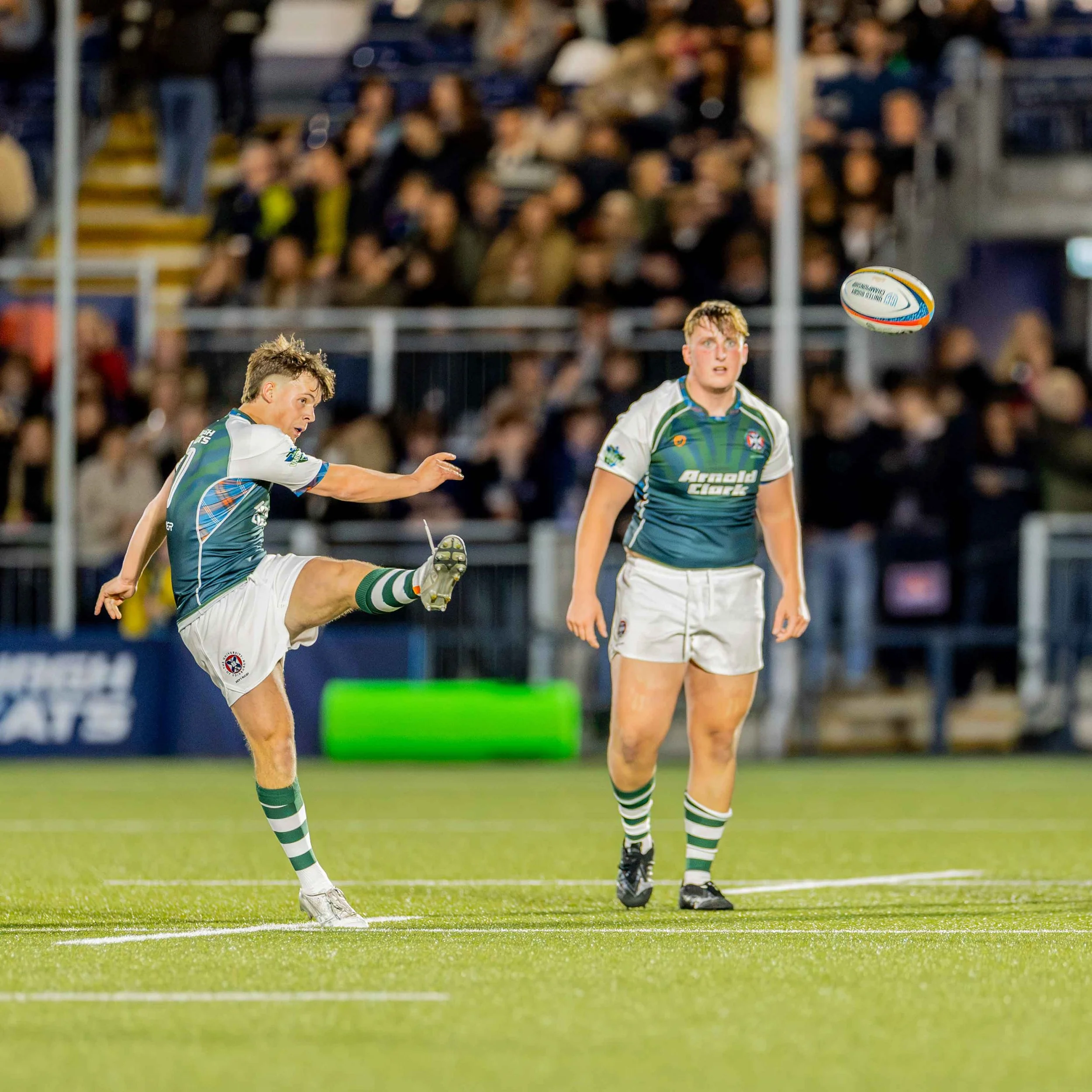 University of Edinburgh fly half kicking the ball at the men's 2026 Varsity event