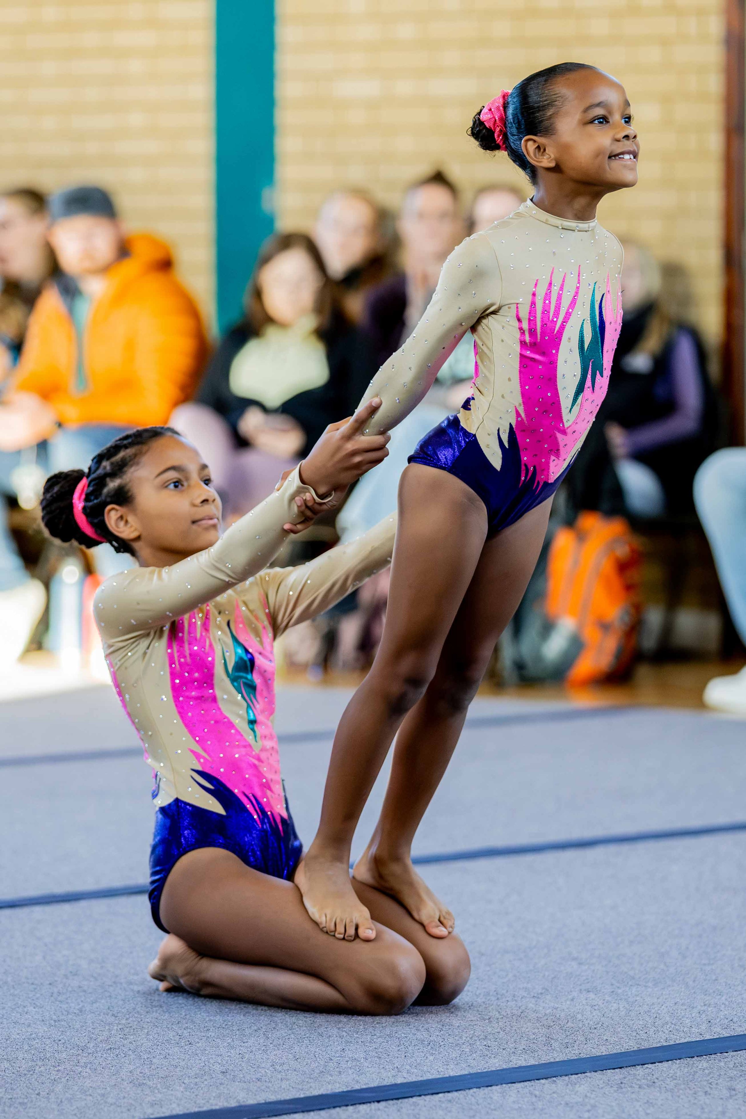 Two acro gymnasts balancing at an event in Bedfordshire