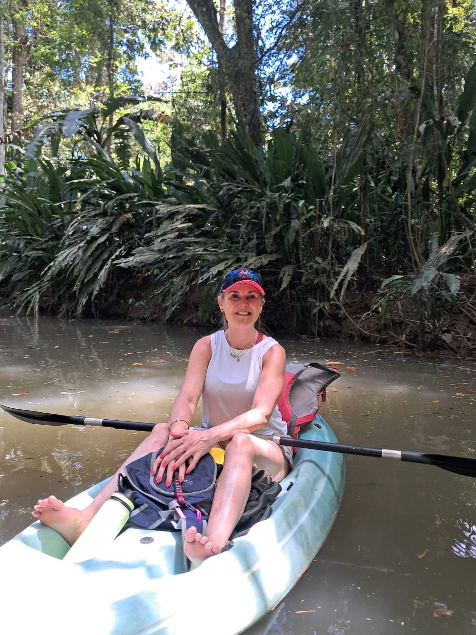Pure Bliss Retreat guest kayaking through the tropical jungle near Puerto Viejo, Costa Rica