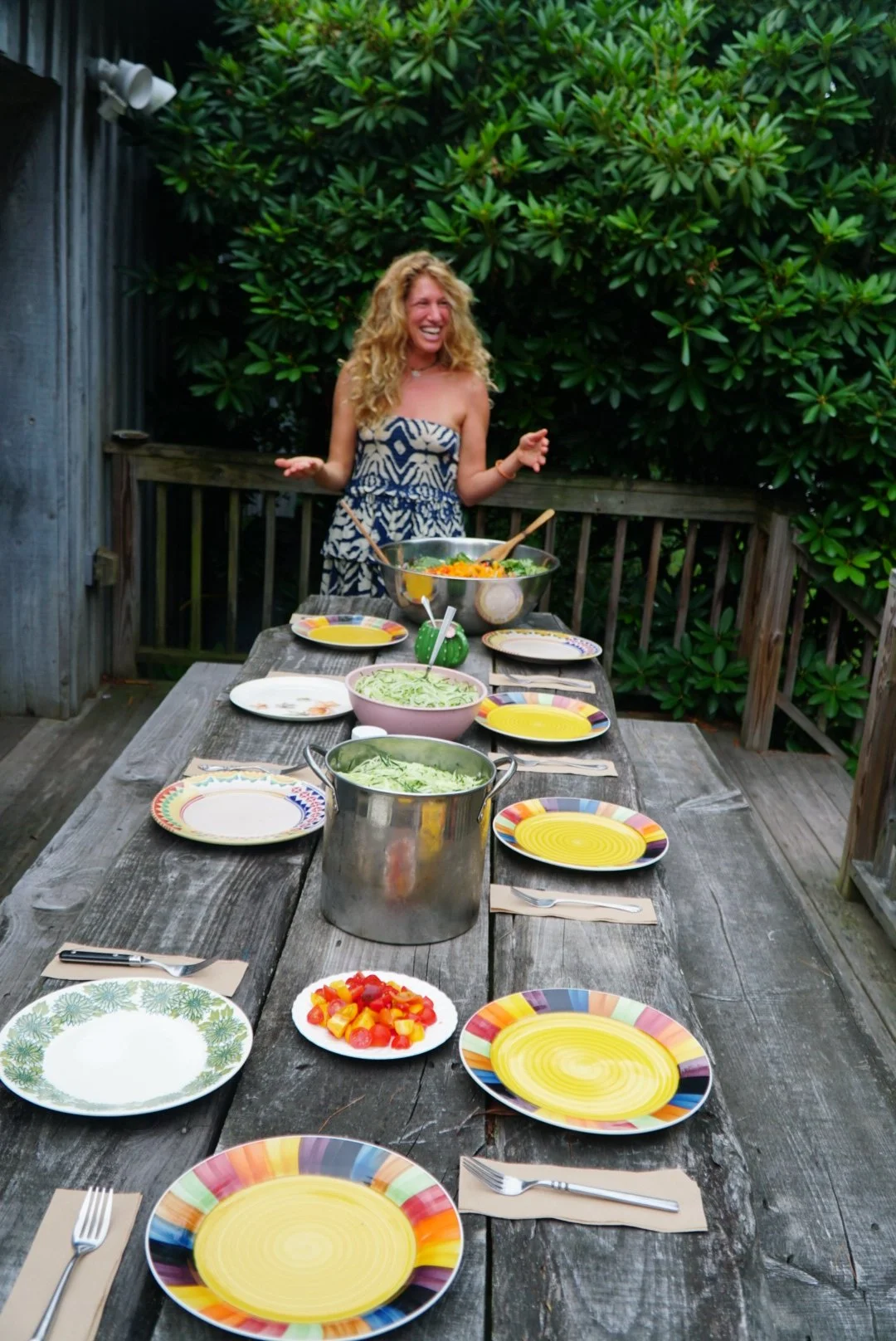 Fern Olivia sharing a colorful plant-based meal outdoors in the Costa Rican jungle