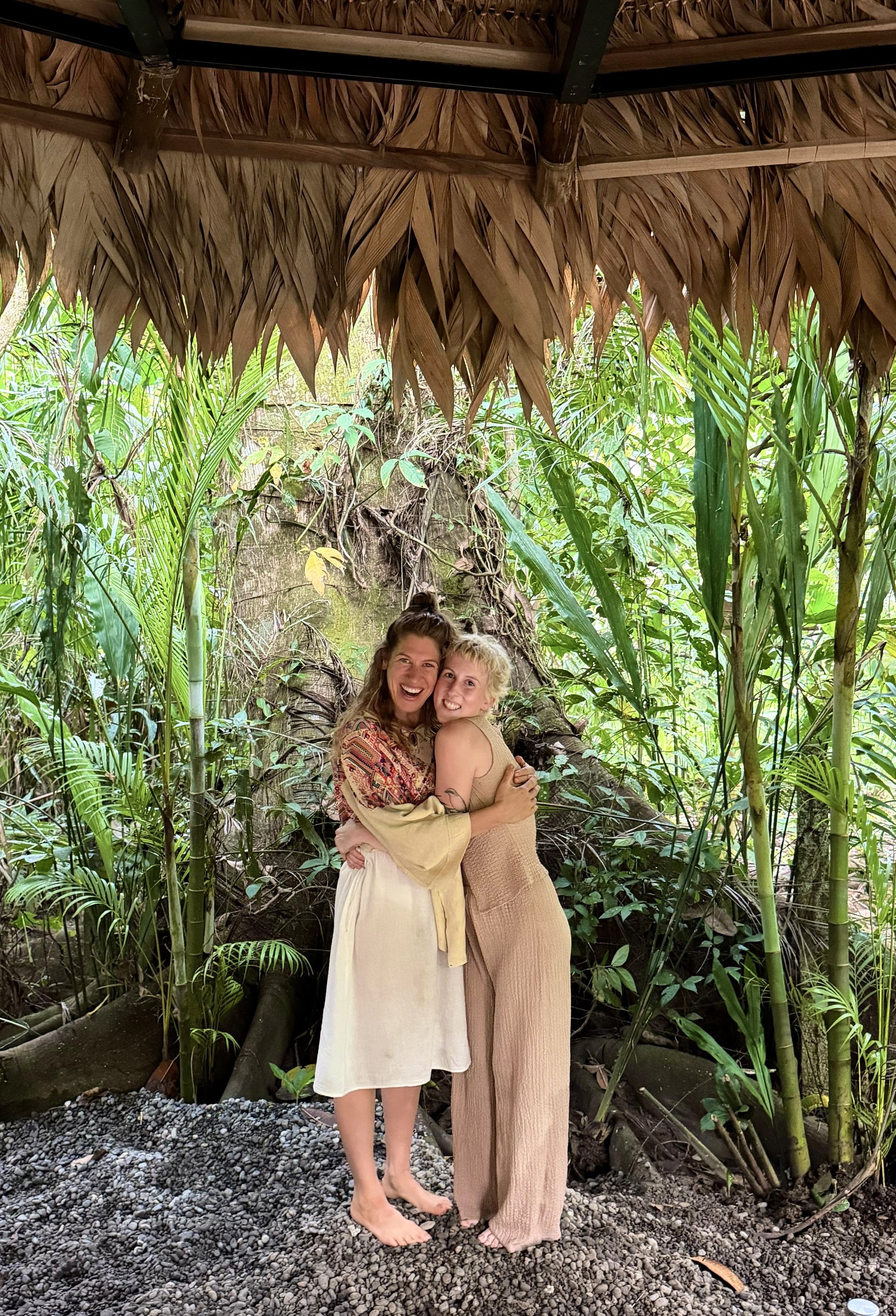 Fern Olivia with a retreat guest surrounded by the tropical jungle in Costa Rica