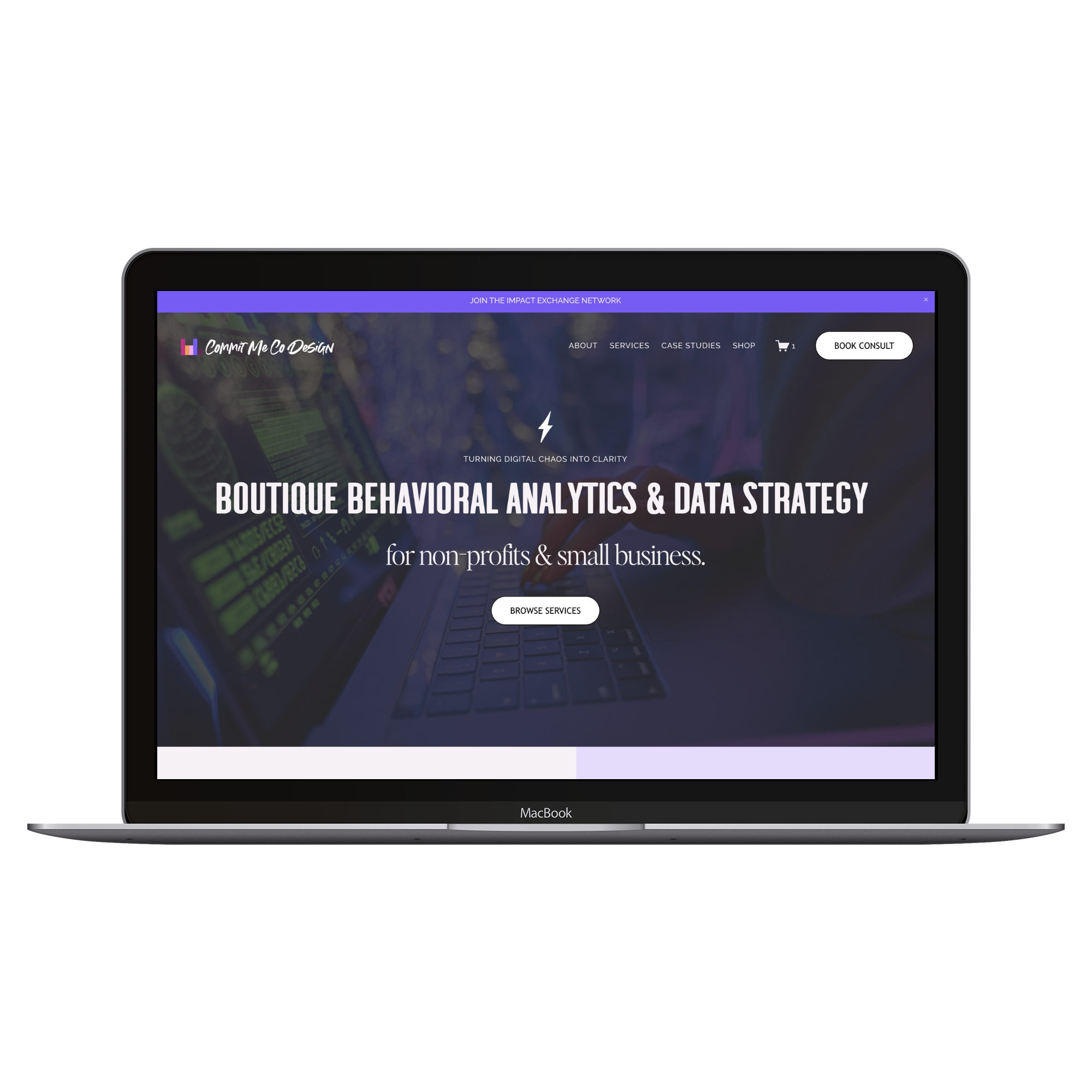 Close-up of a MacBook laptop showing a website for boutique behavioral analytics and data strategy, with a visible keyboard and dark themed background.
