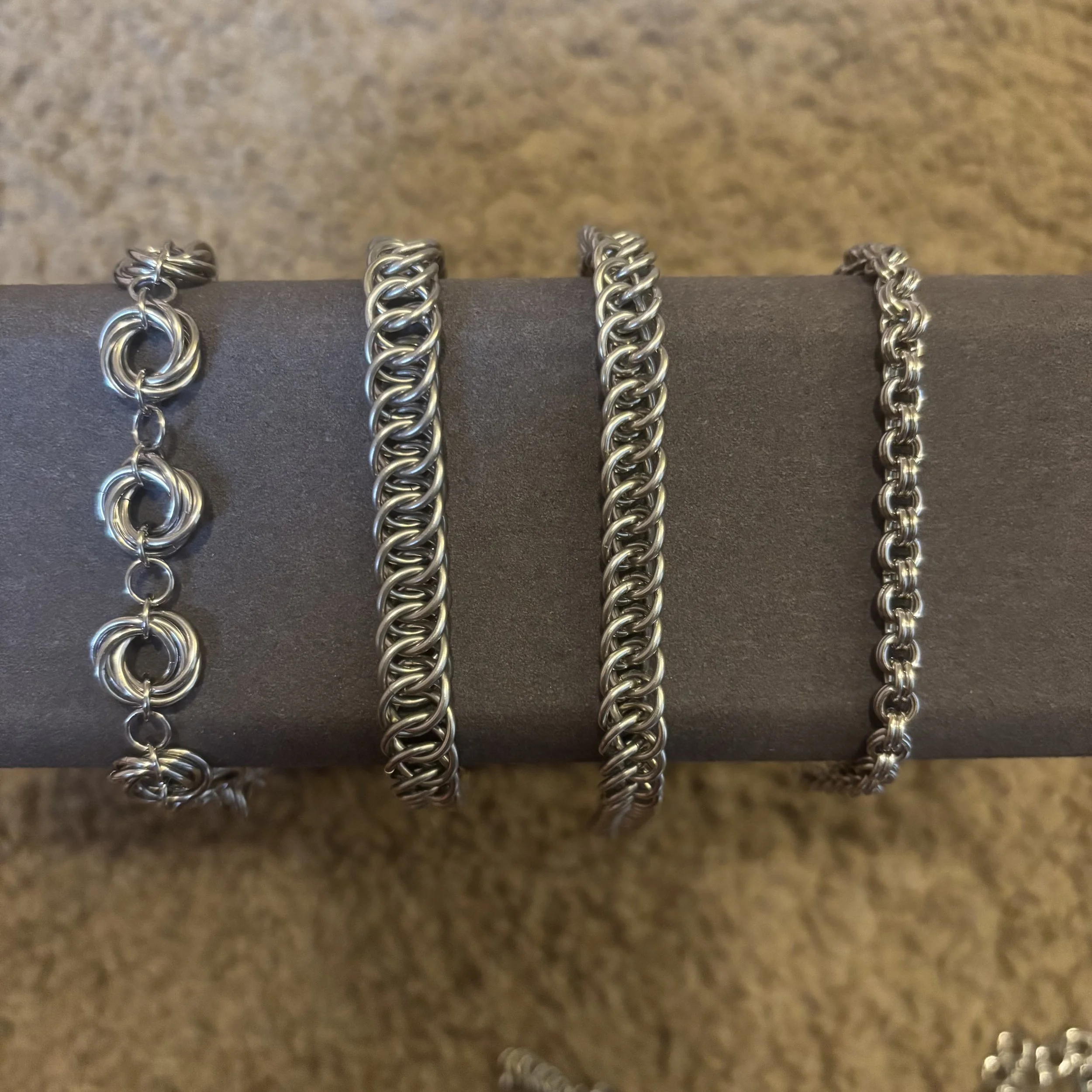 Left to right: Mobius ball, Half persian 4-in-1, slightly smaller half persian 4-in-1, 2-in-2 