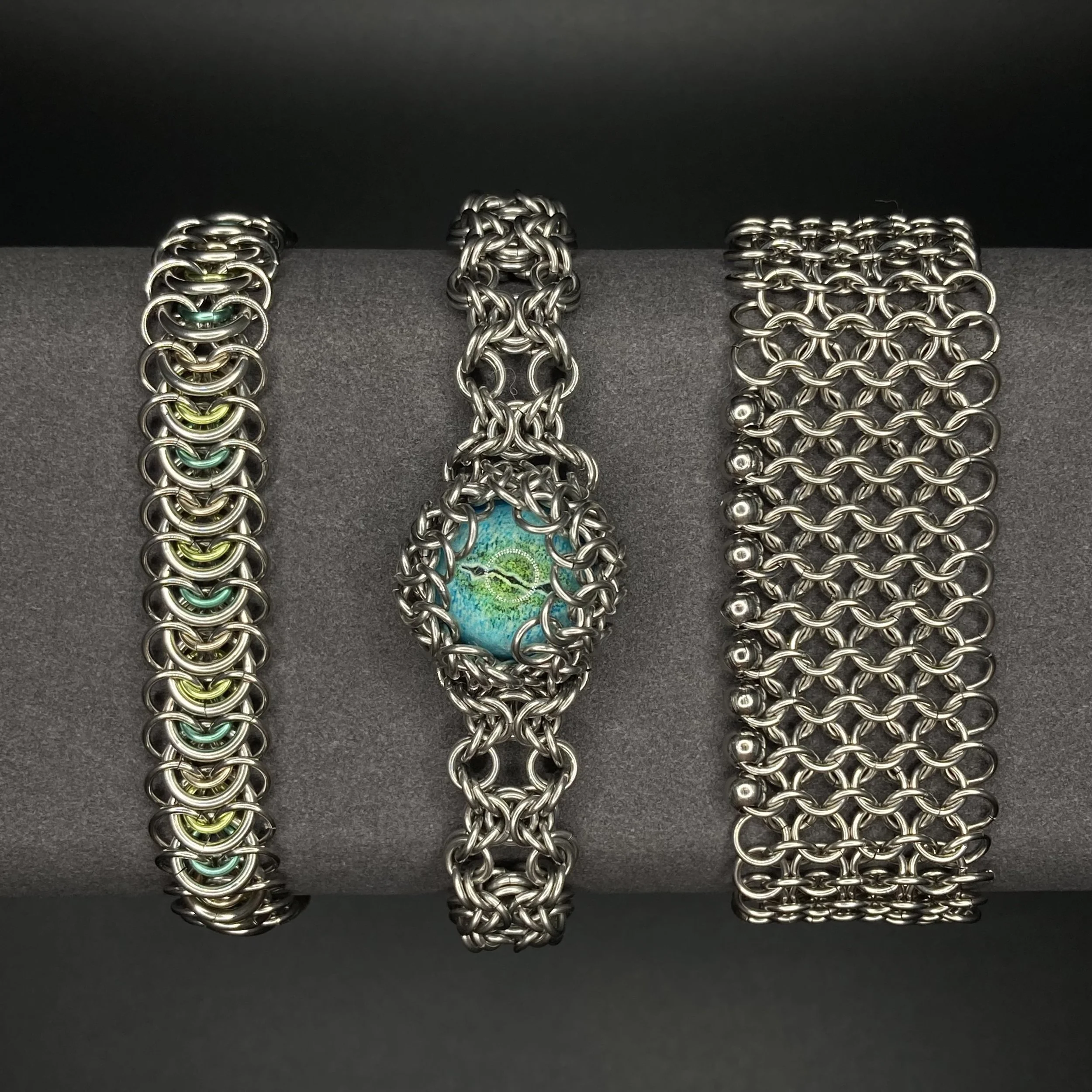 Left to right: Vertebrae, Eyeball bracelet, European 4-in-1 with bead details