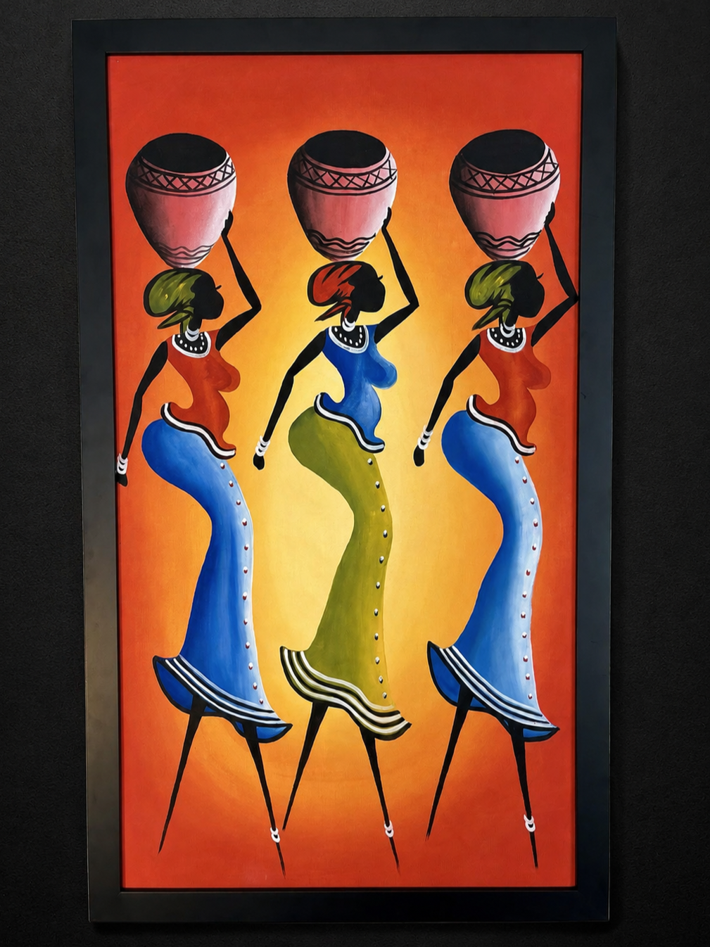 “3 African women with pots on their heads”