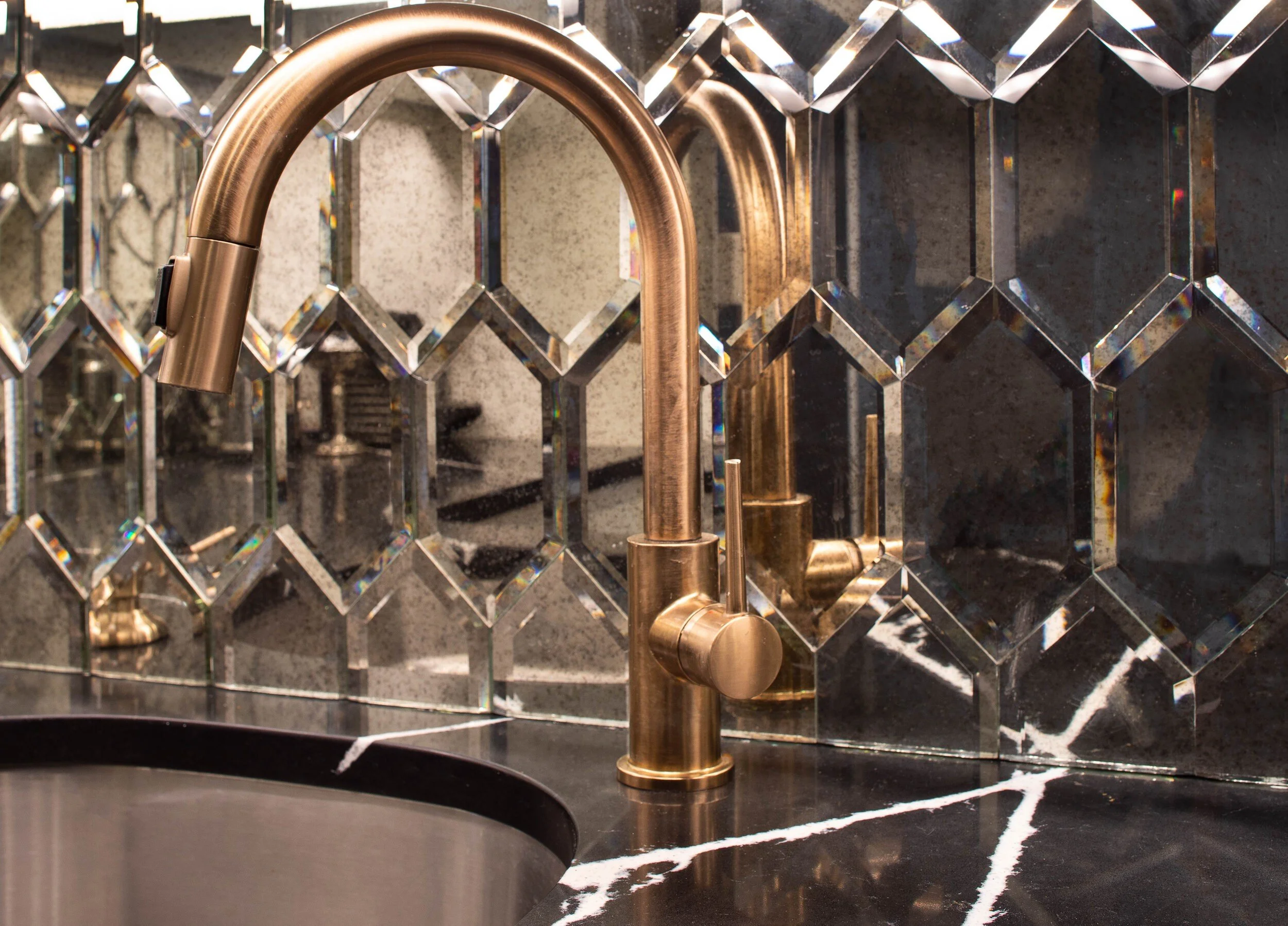 13-brass-faucet-mirrored-backsplash-nyc.jpg