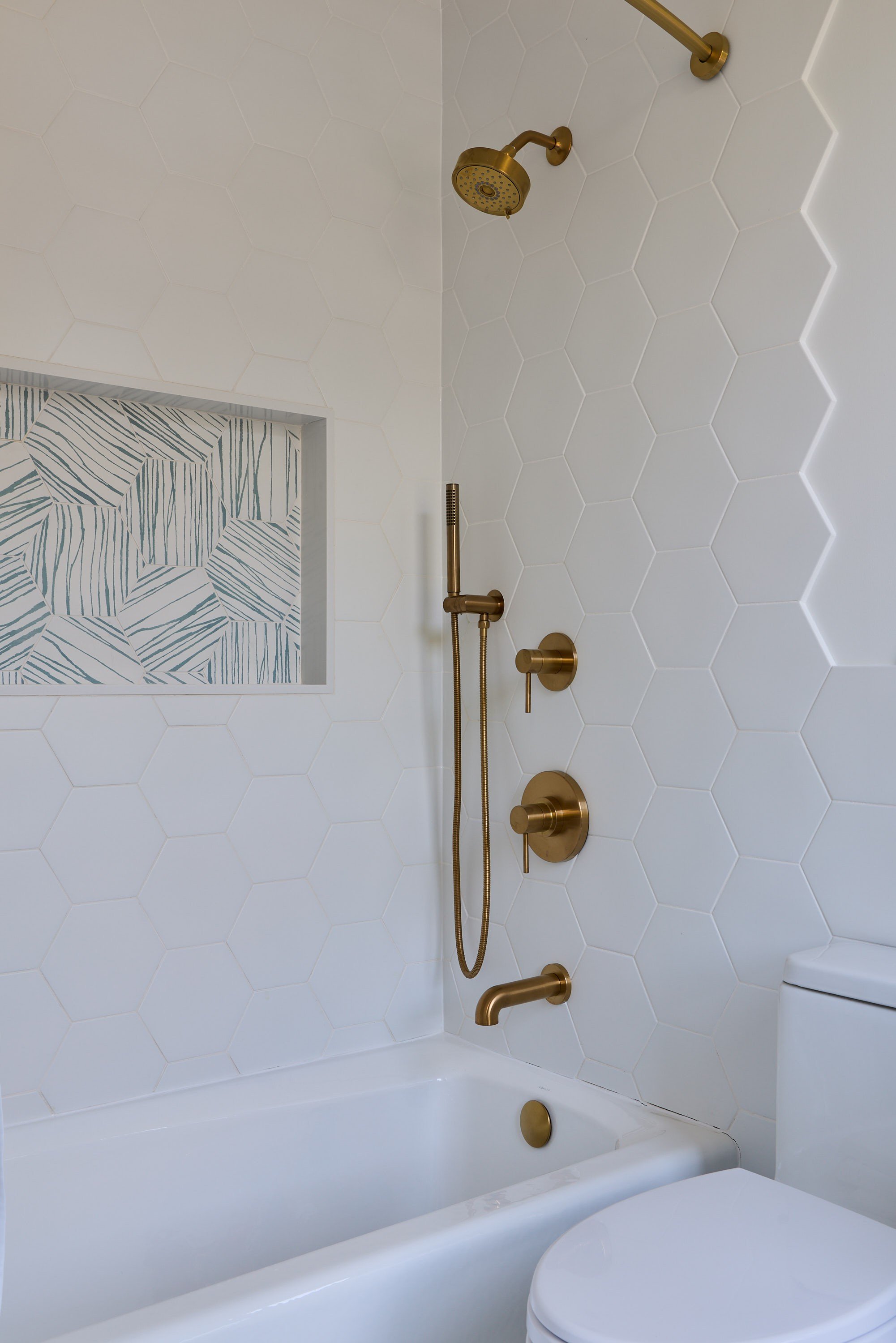 16-bathroom-brass-fixtures-tub-shower-nyc.jpg