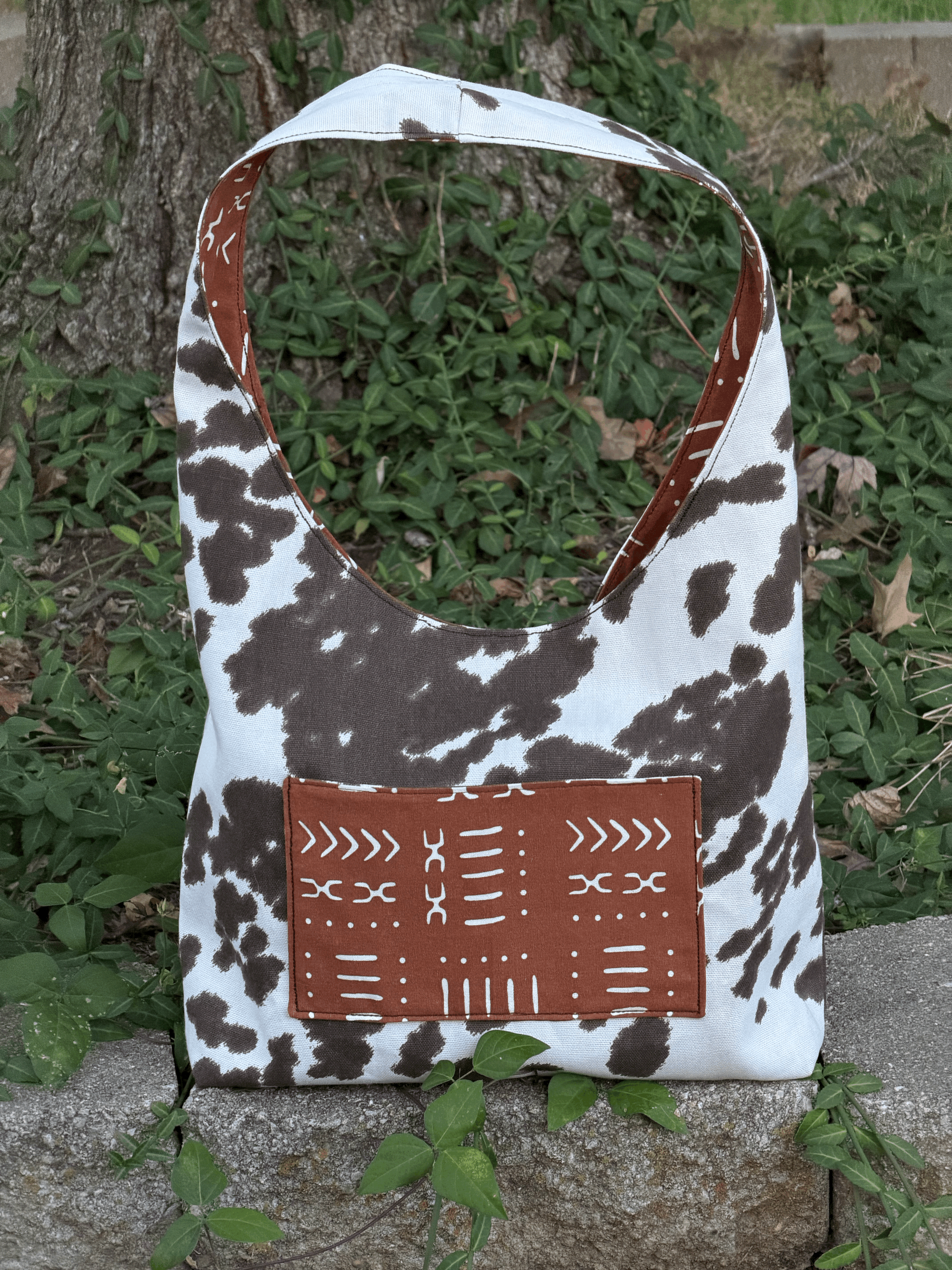 Cow Print & Burnt Orange Abstract - Small Sling