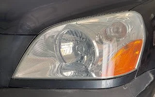 Close-up of a car headlight with clear and bright lens after headlight restoration service