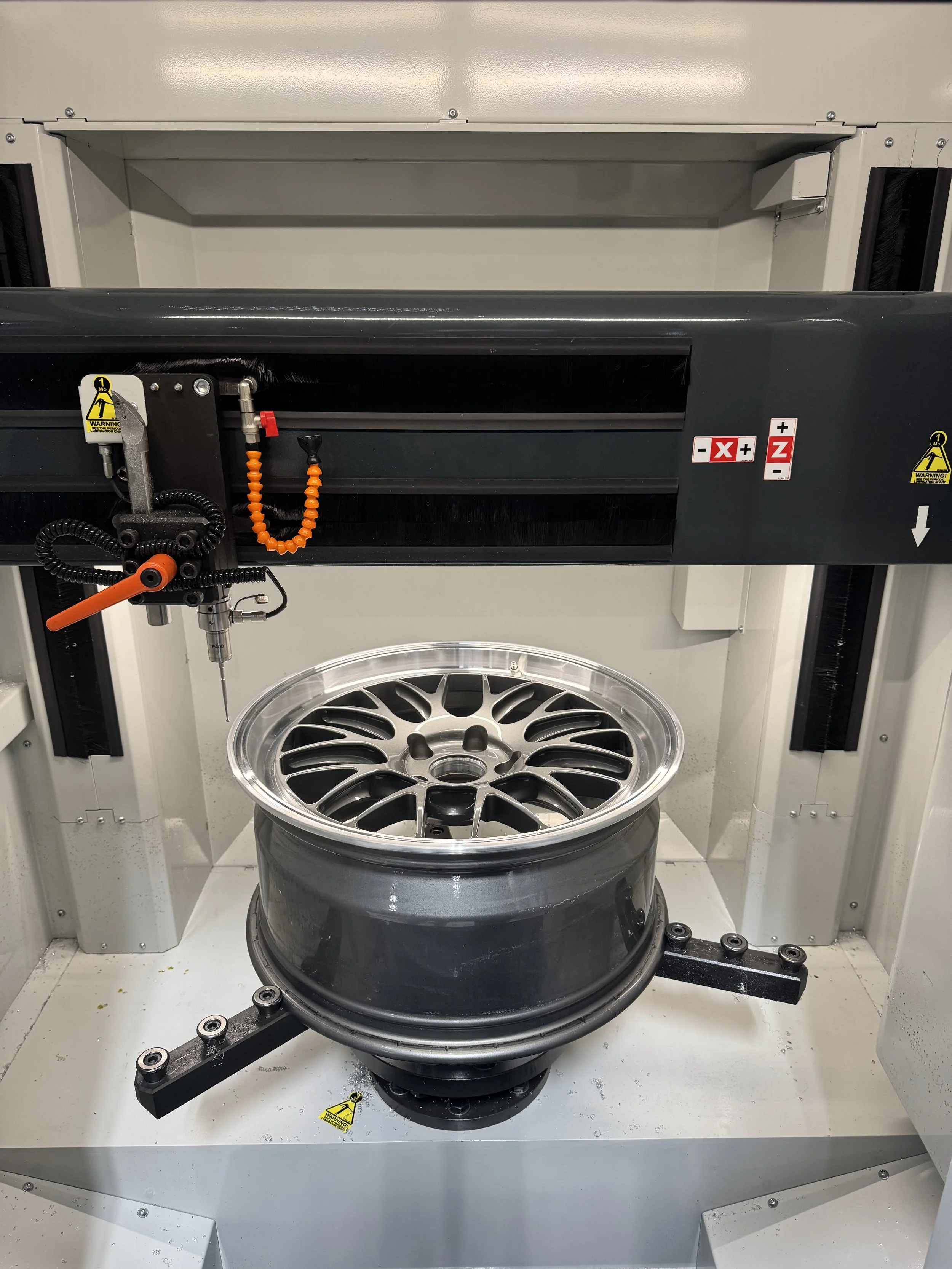 A premium diamond cutting lathe, with a premium wheel, resurfacing to a factory finish.