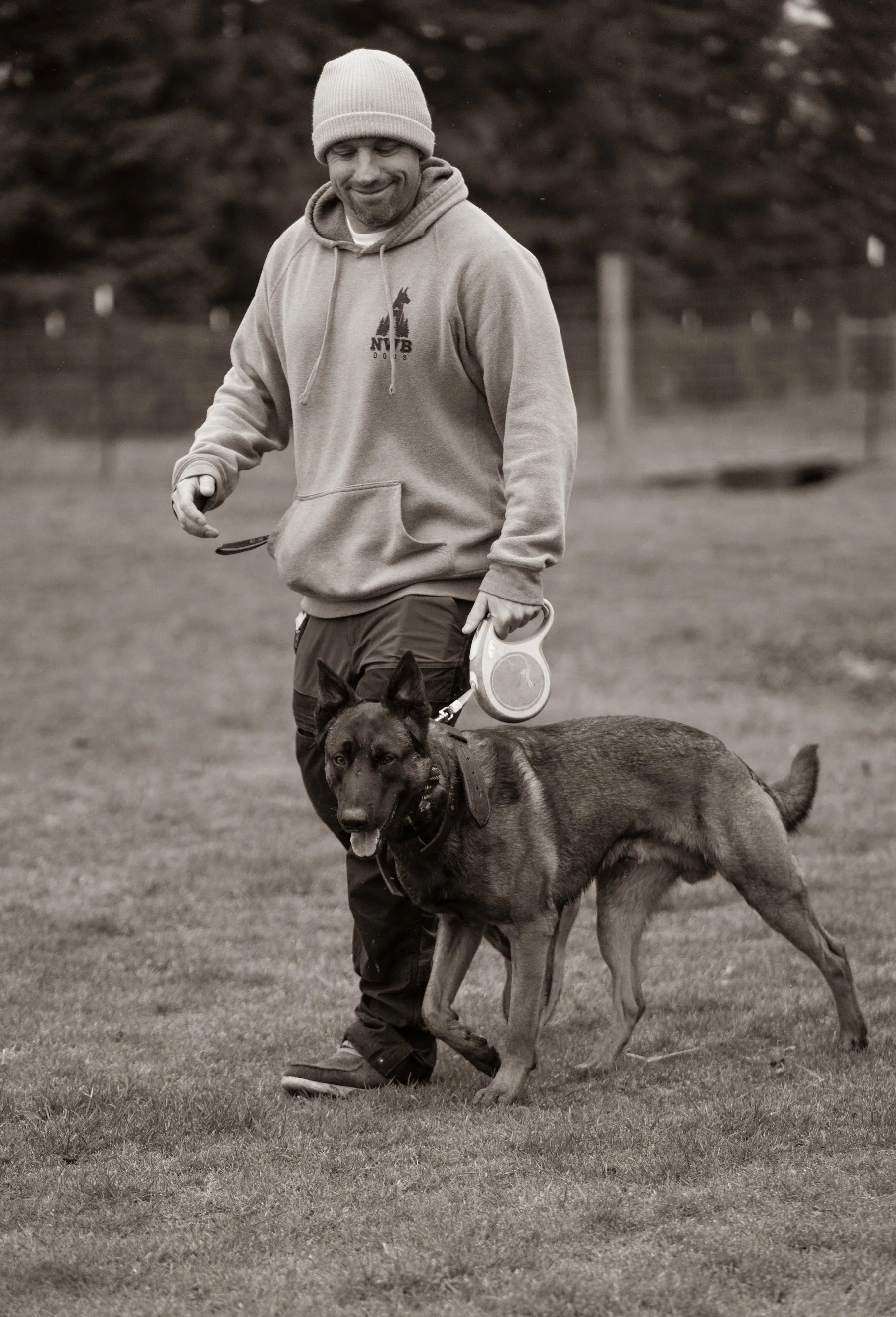 Matt Luchsinger walking a dog during a private training session