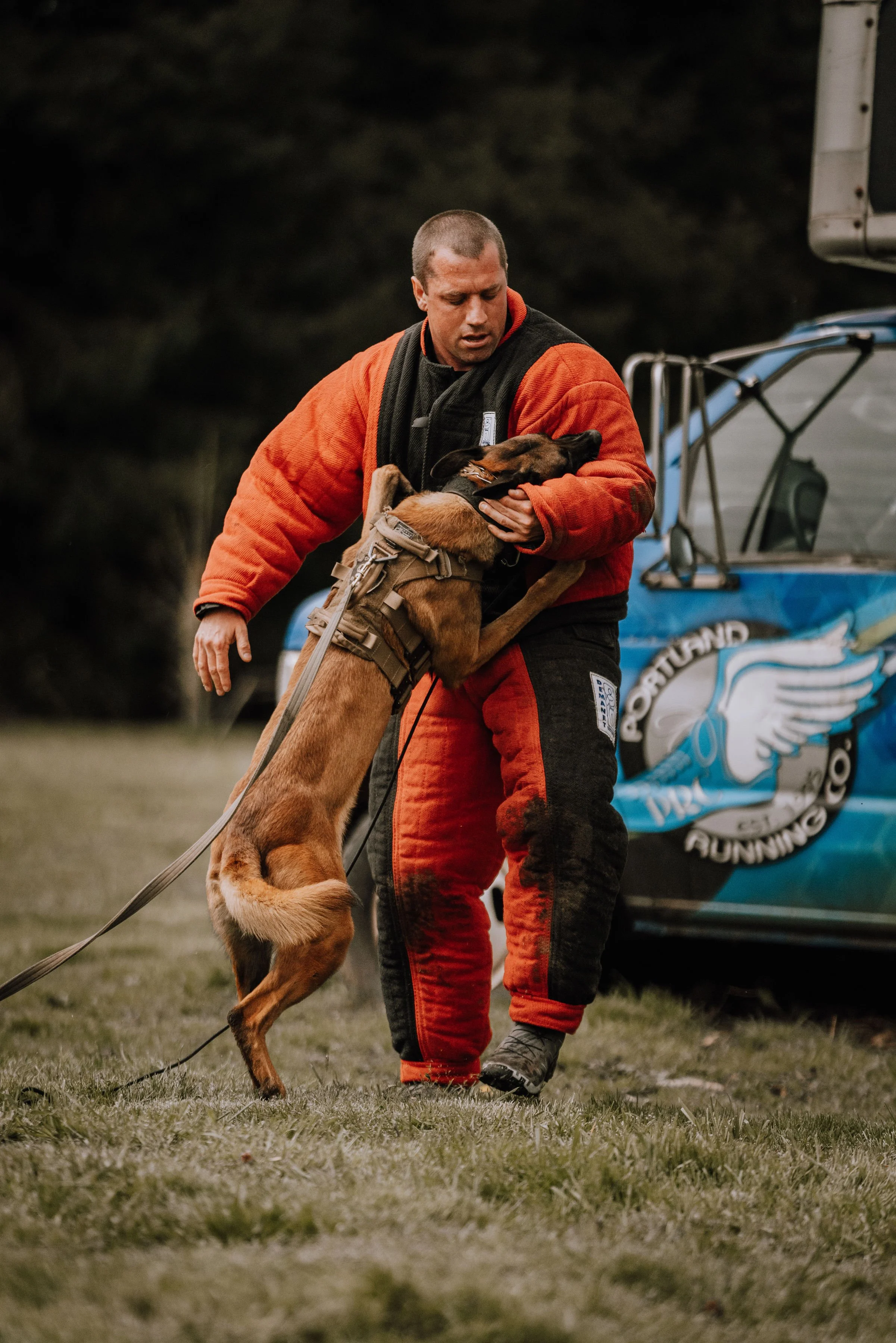 Matt Luchsinger working a Belgian Malinois during protection dog training