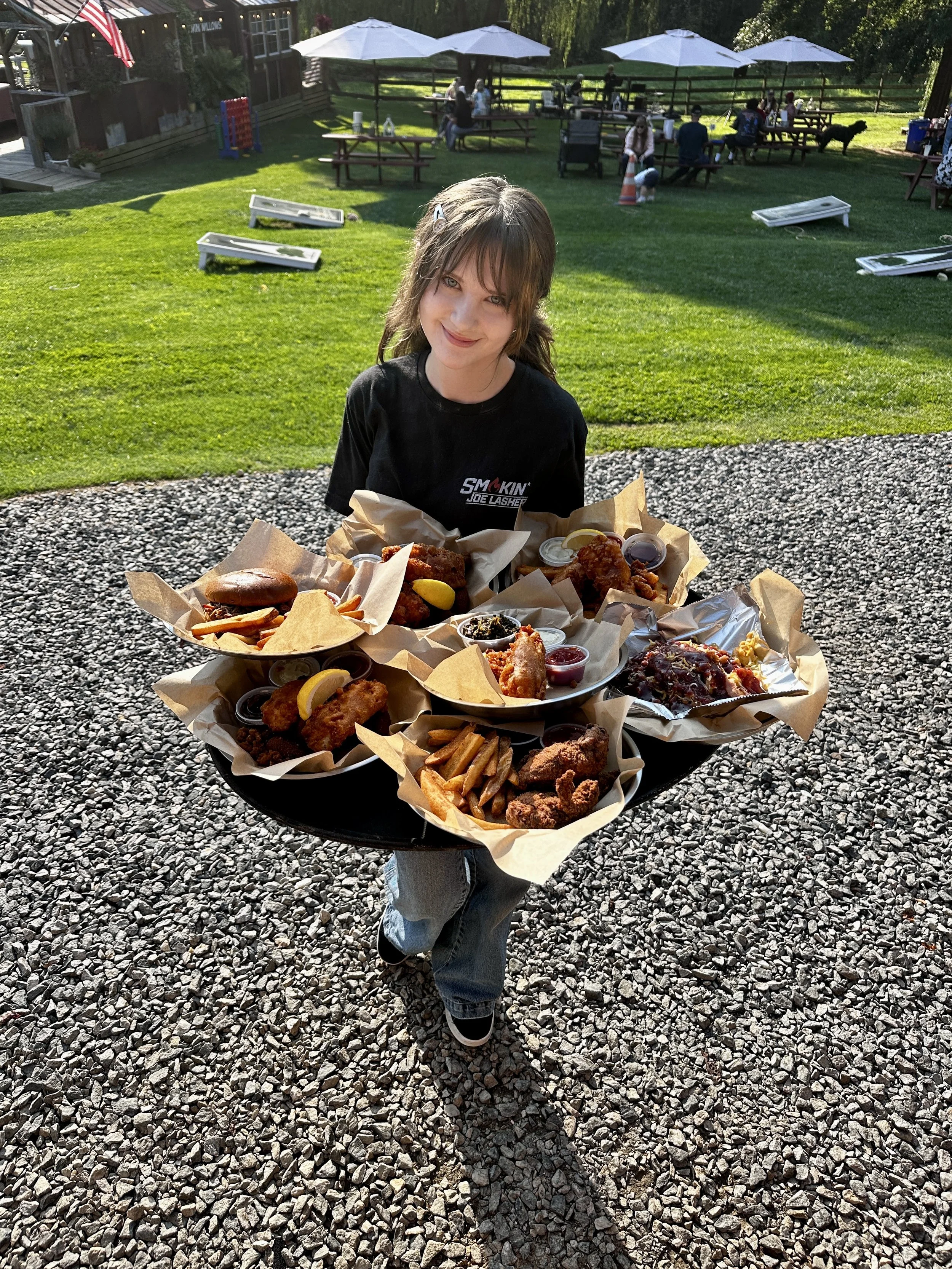 Smokin’ Joe Lasher food served outdoors at Twin Willows.