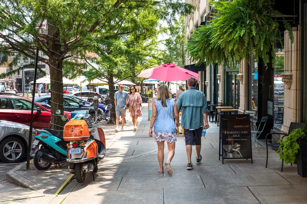 Visitors exploring downtown Asheville, North Carolina, near Twin Willows.