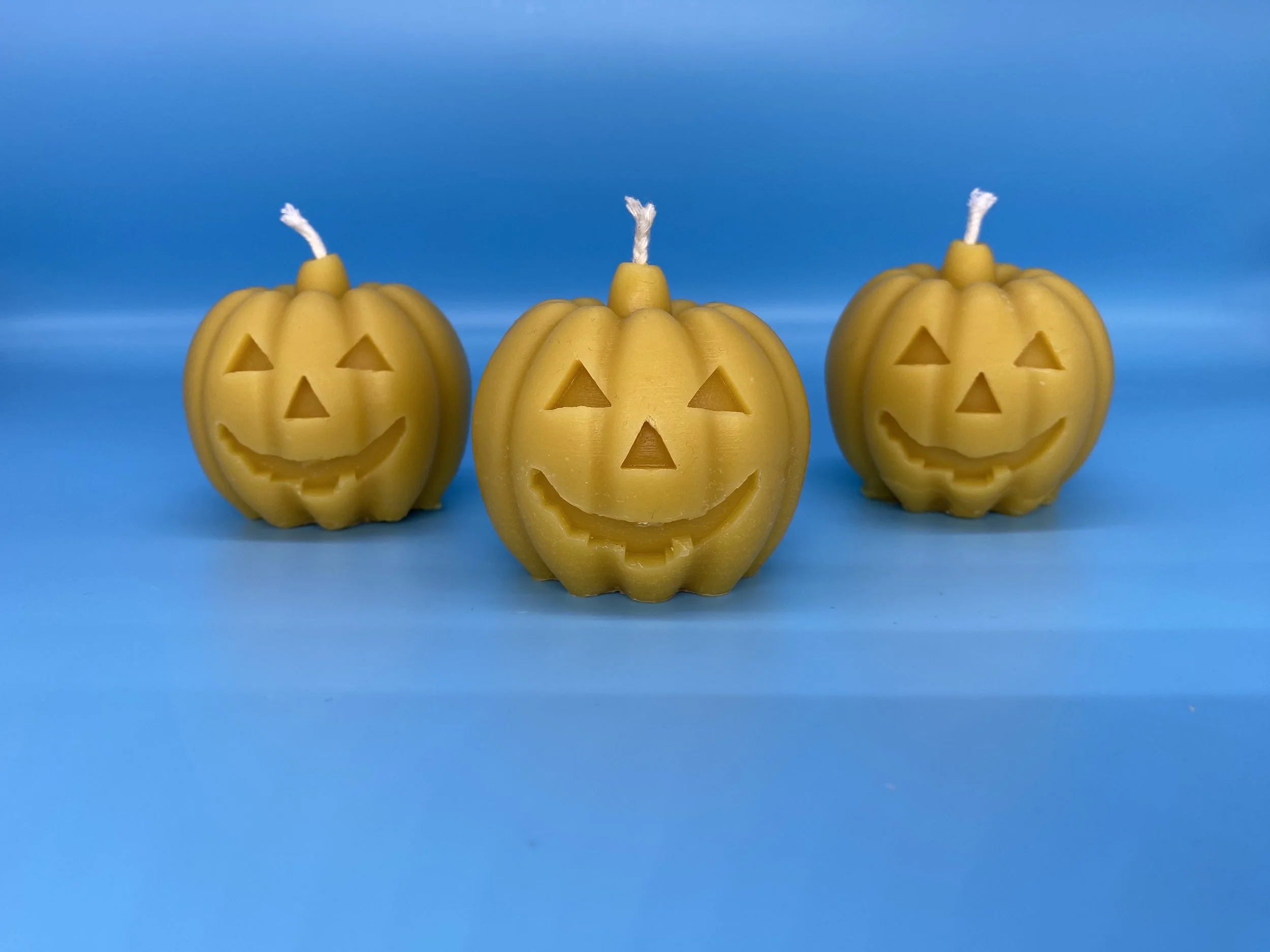 three-beeswax-candles-web.jpeg