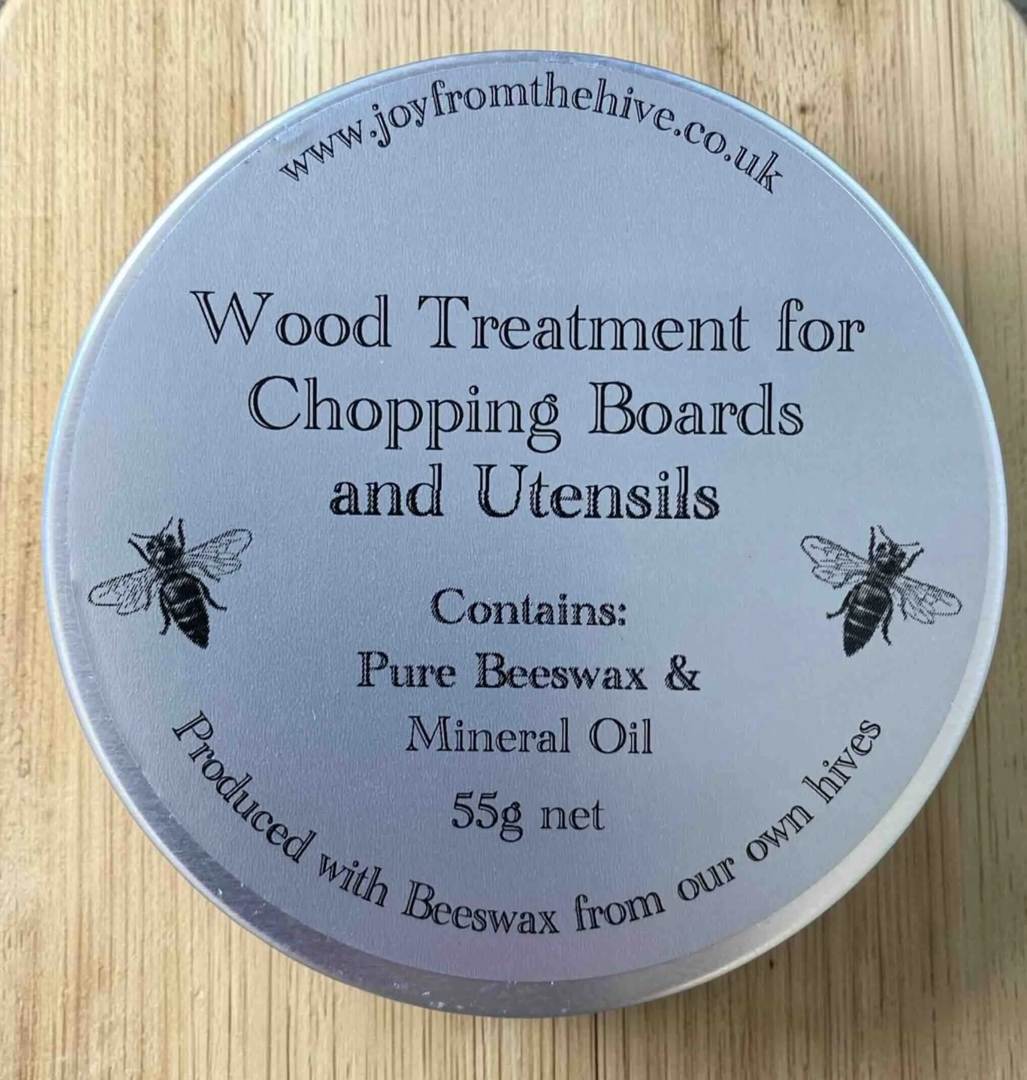 Wood Treatment for Chopping Boards and Utensils in a silver tin. Contains Beeswax