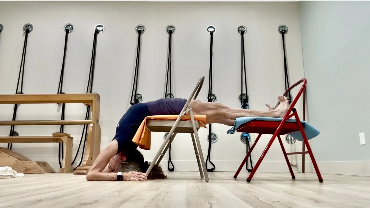 Supported Dwi Pada Viparita Dandasana (supported two-legs inverted staff pose)