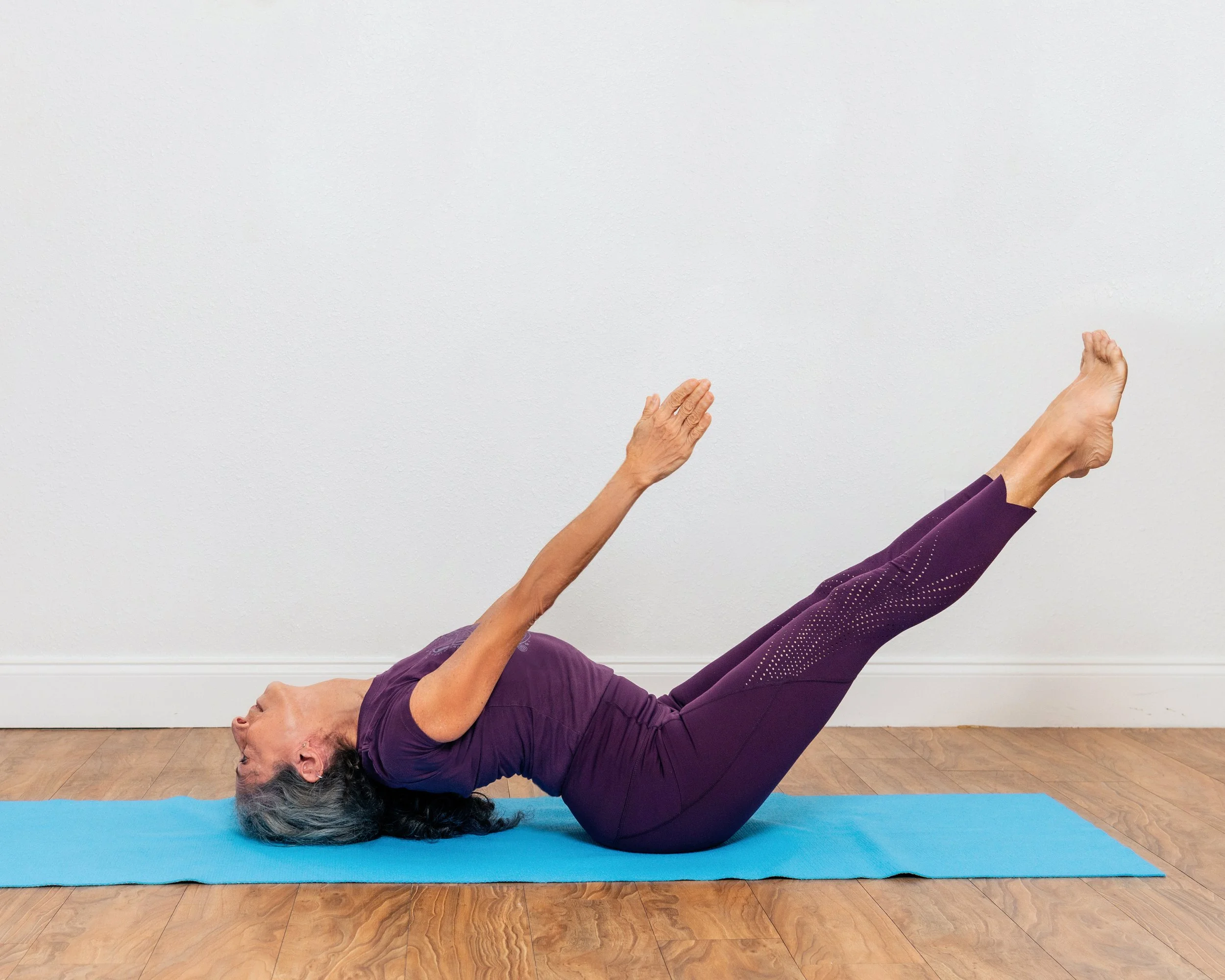 Uttana Padasana (Facing Up with Arms and Legs Extended