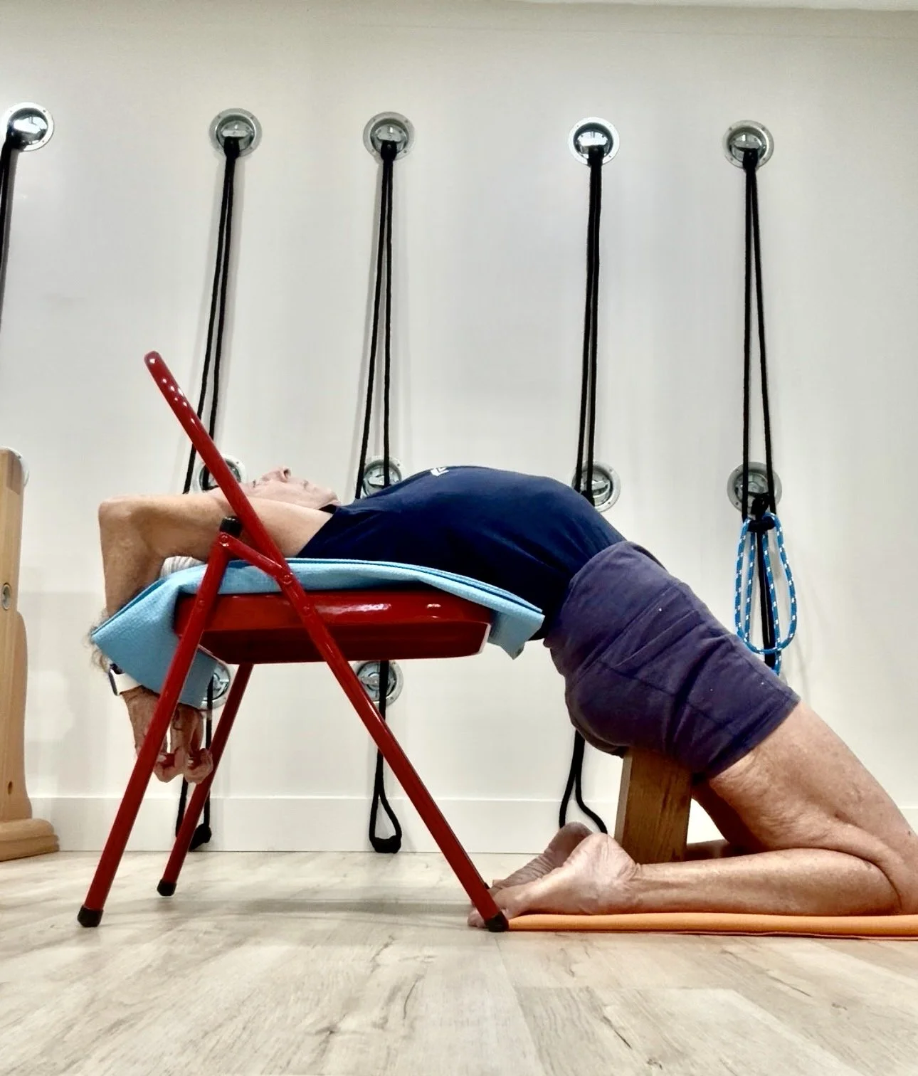Supported Kapotasana (supported pigeon pose)